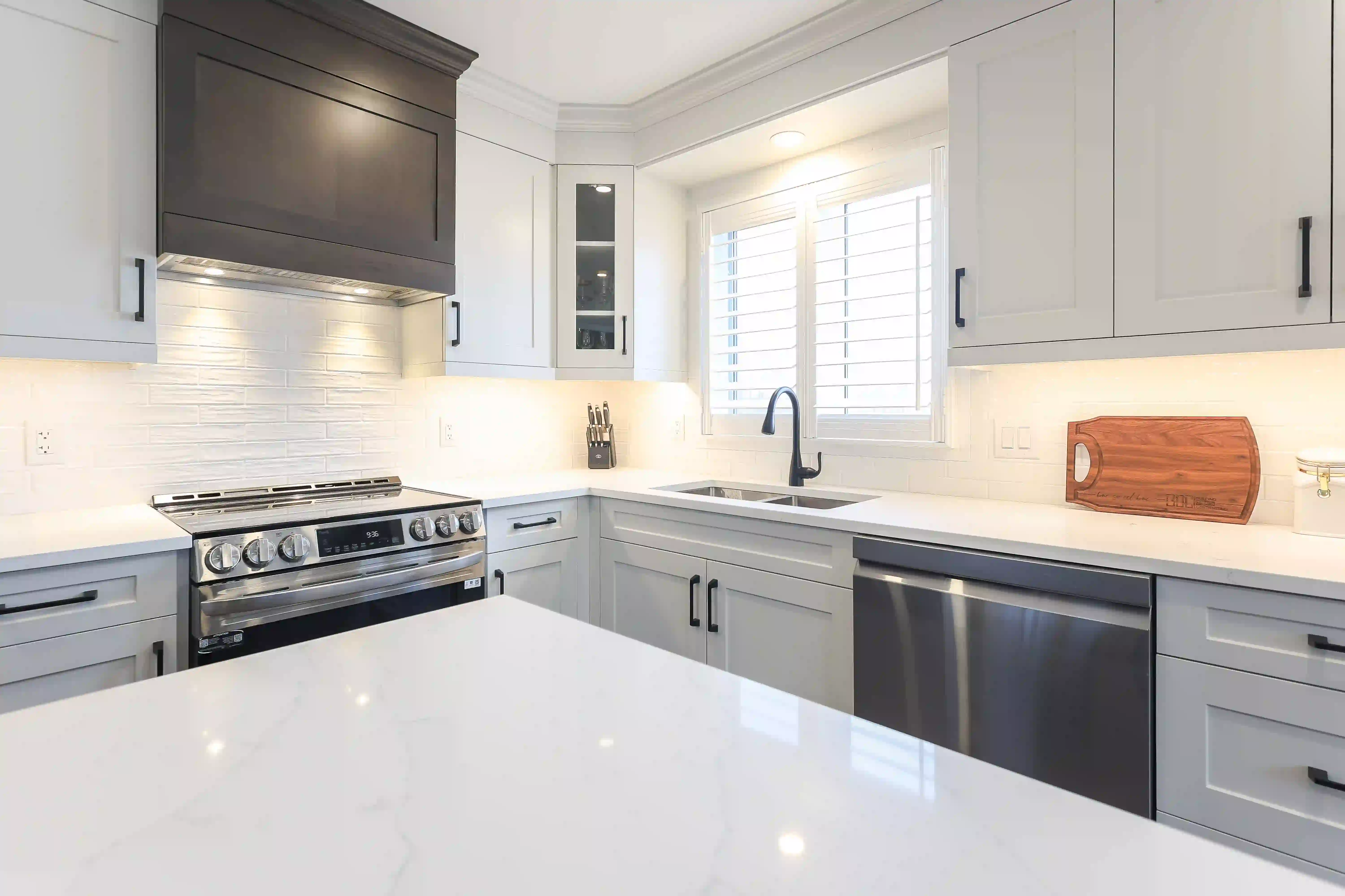 Kitchen range and white cabinetry