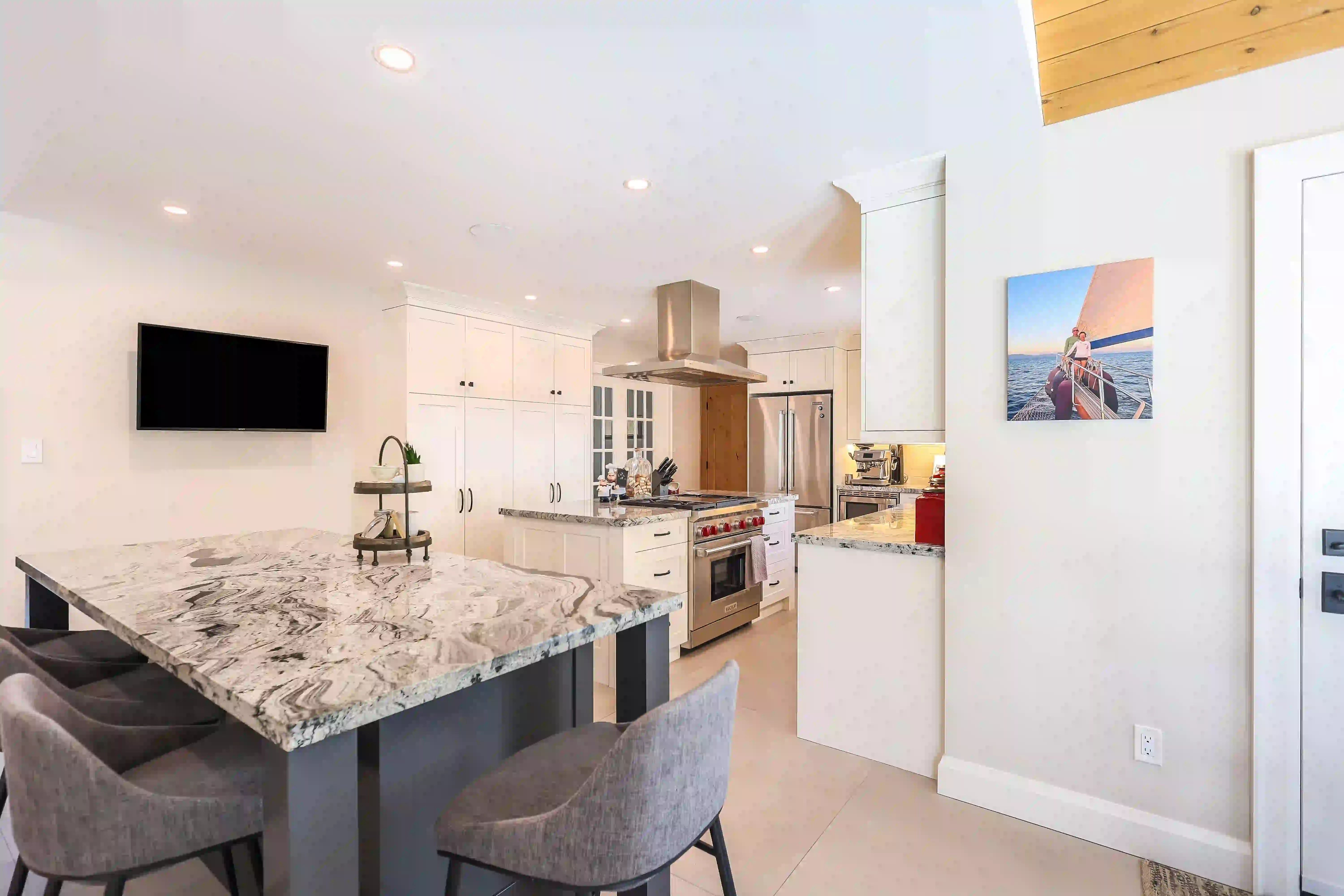 Kitchen island and wall-mounted TV