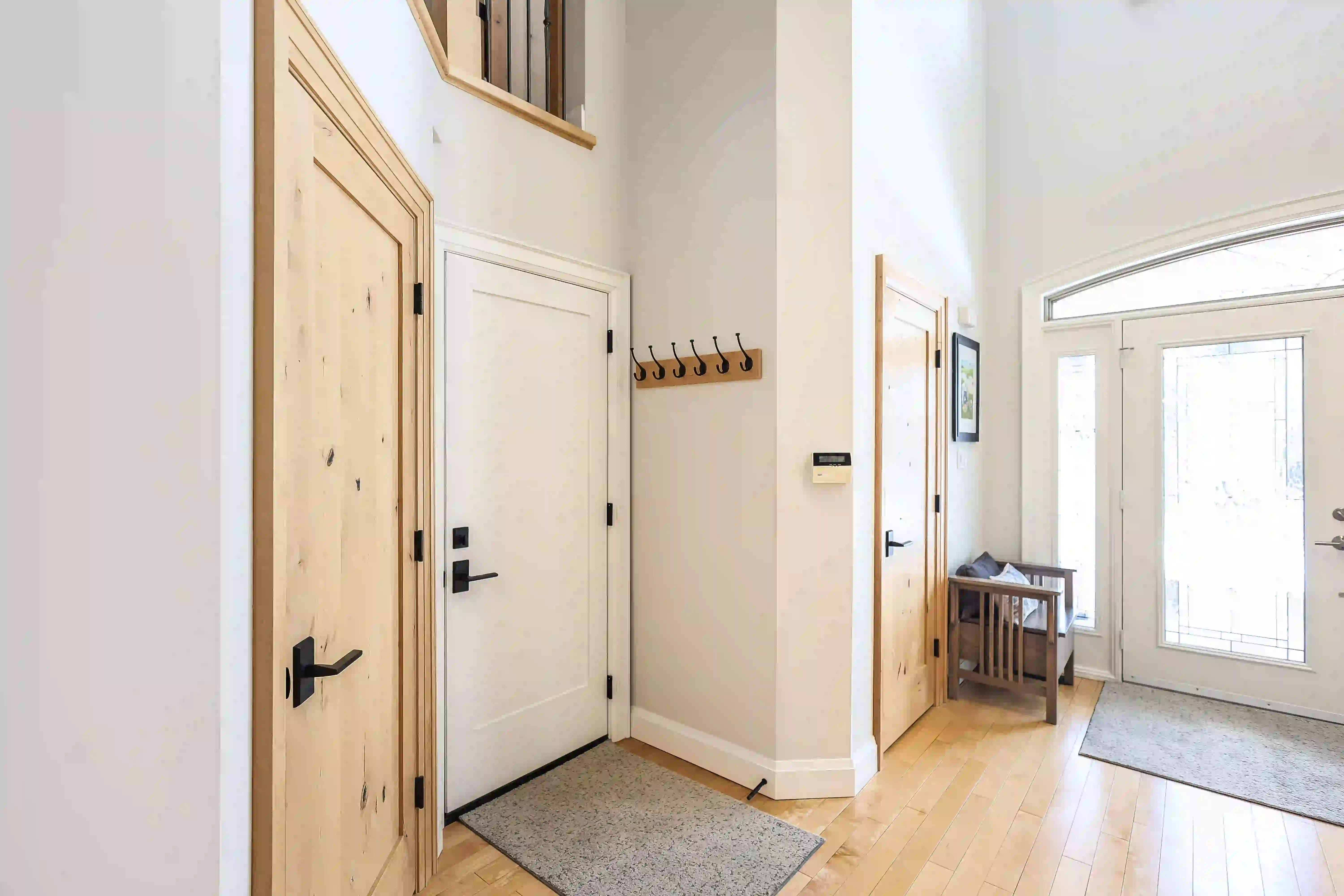 Entry hallway and wood door