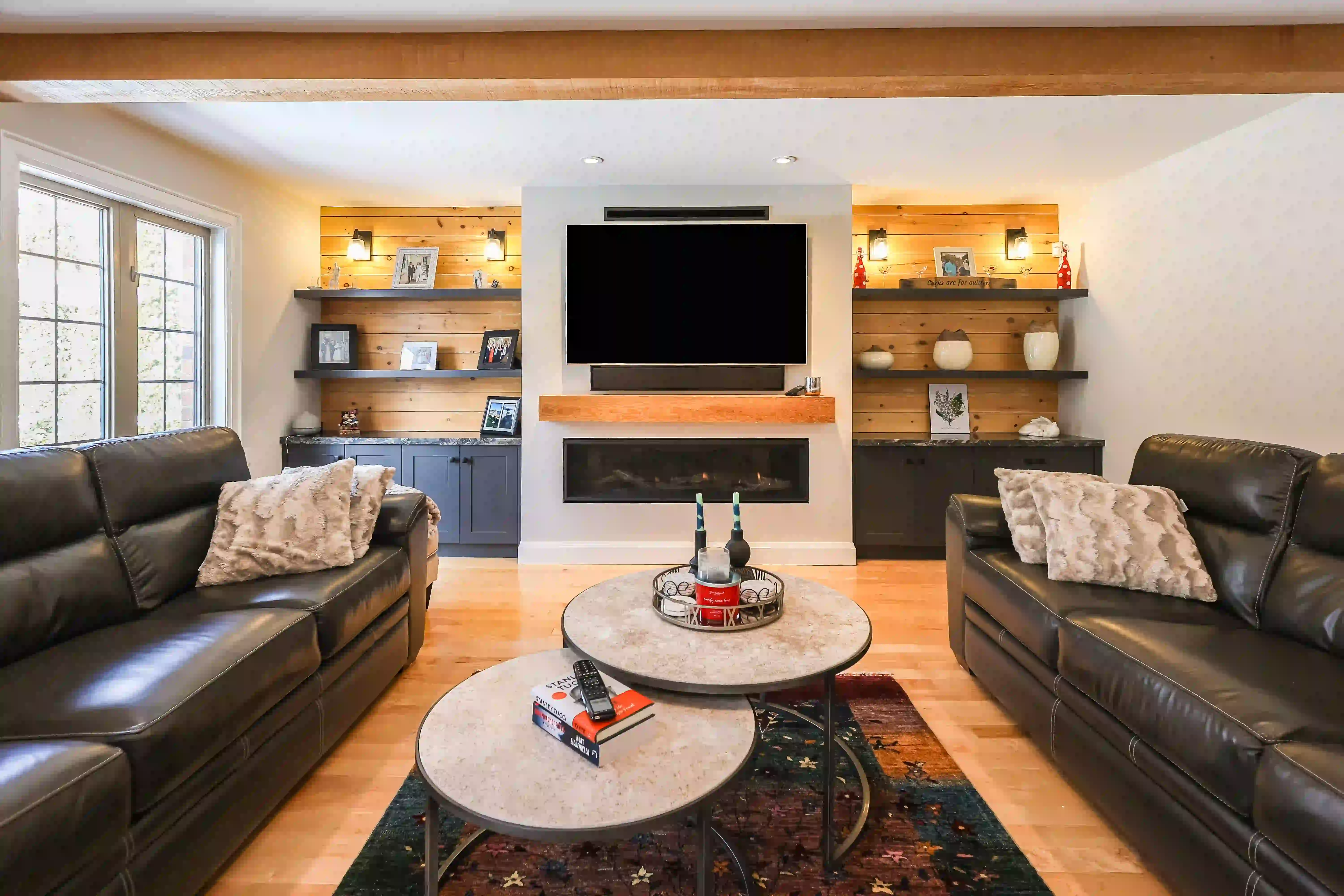 Living room seating and fireplace wall