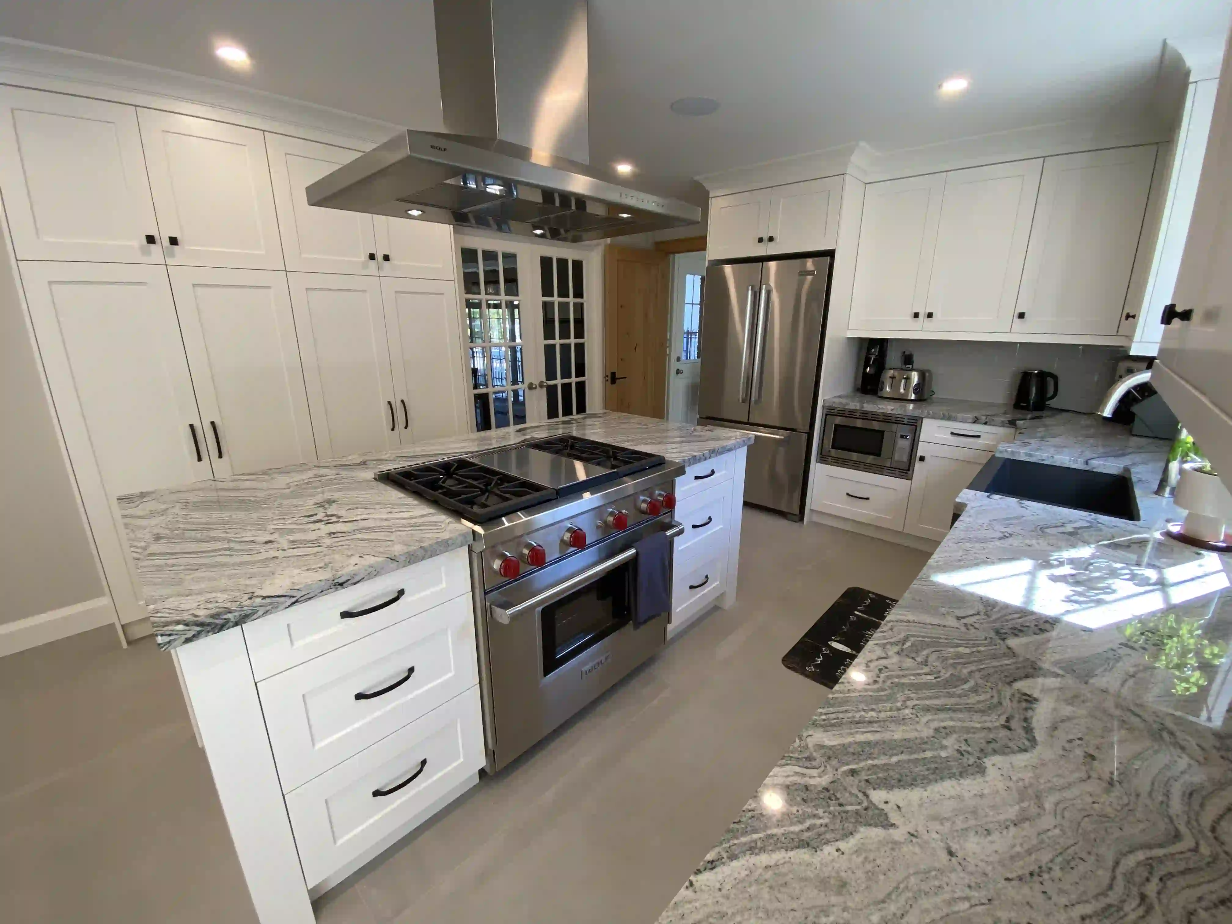 Kitchen range and marble counters