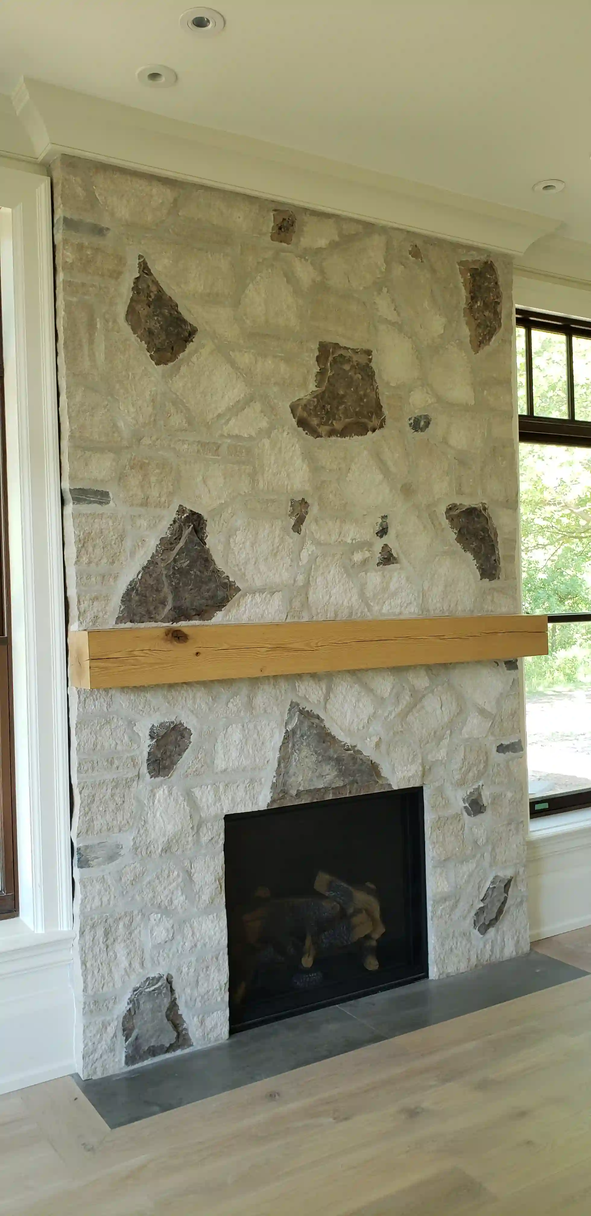 Stone fireplace and mantle