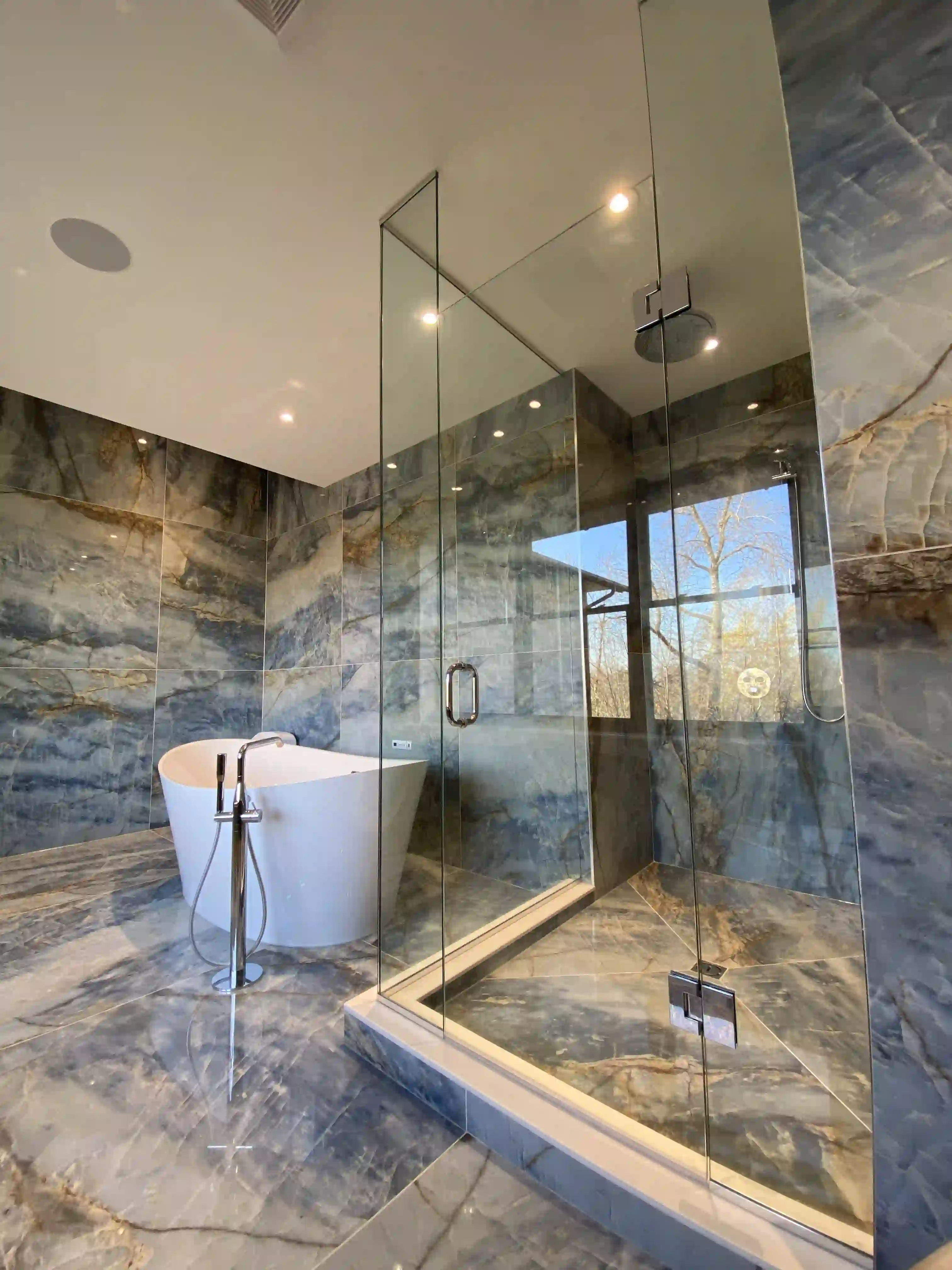 Glass shower and freestanding tub