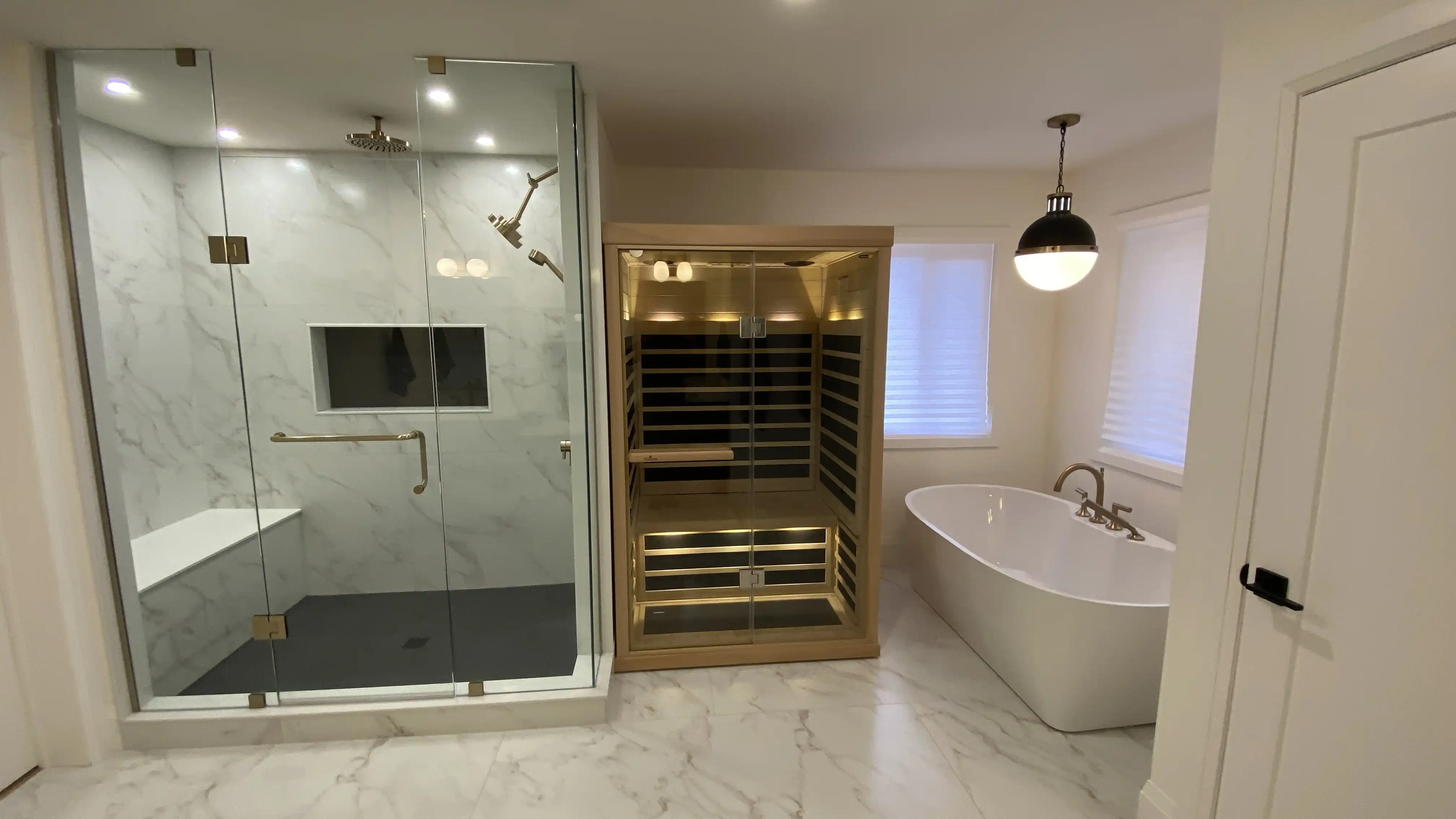 Ensuite with glass shower, sauna and freestanding tub