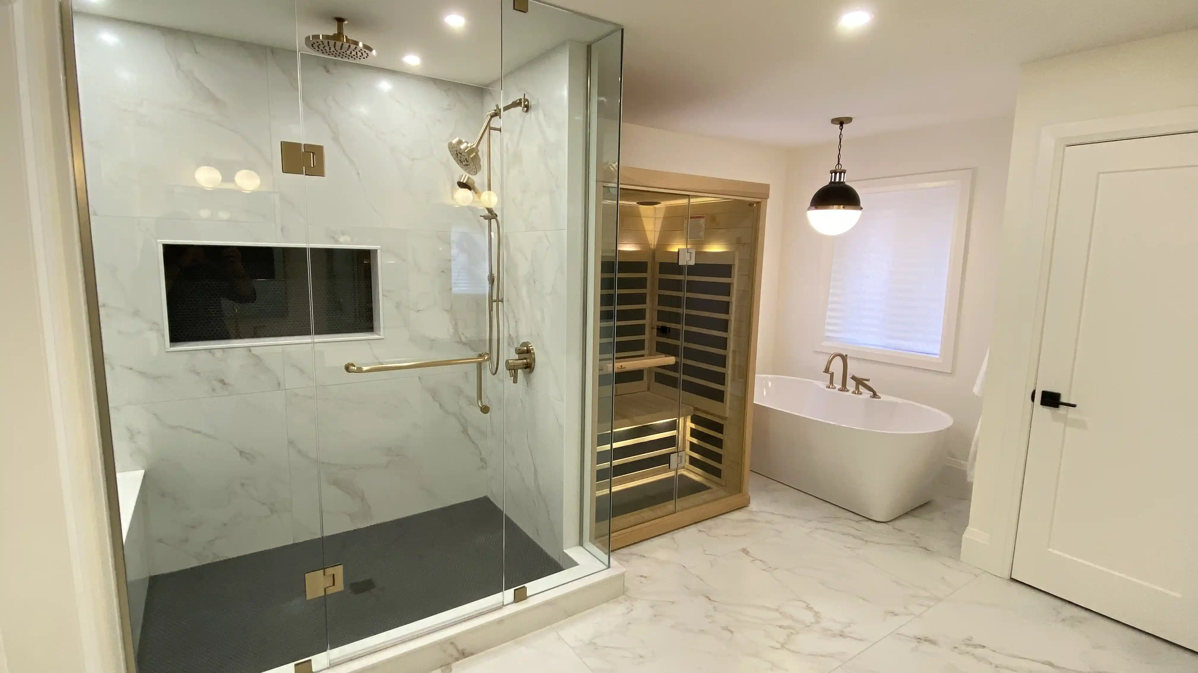 Shower, sauna and freestanding tub
