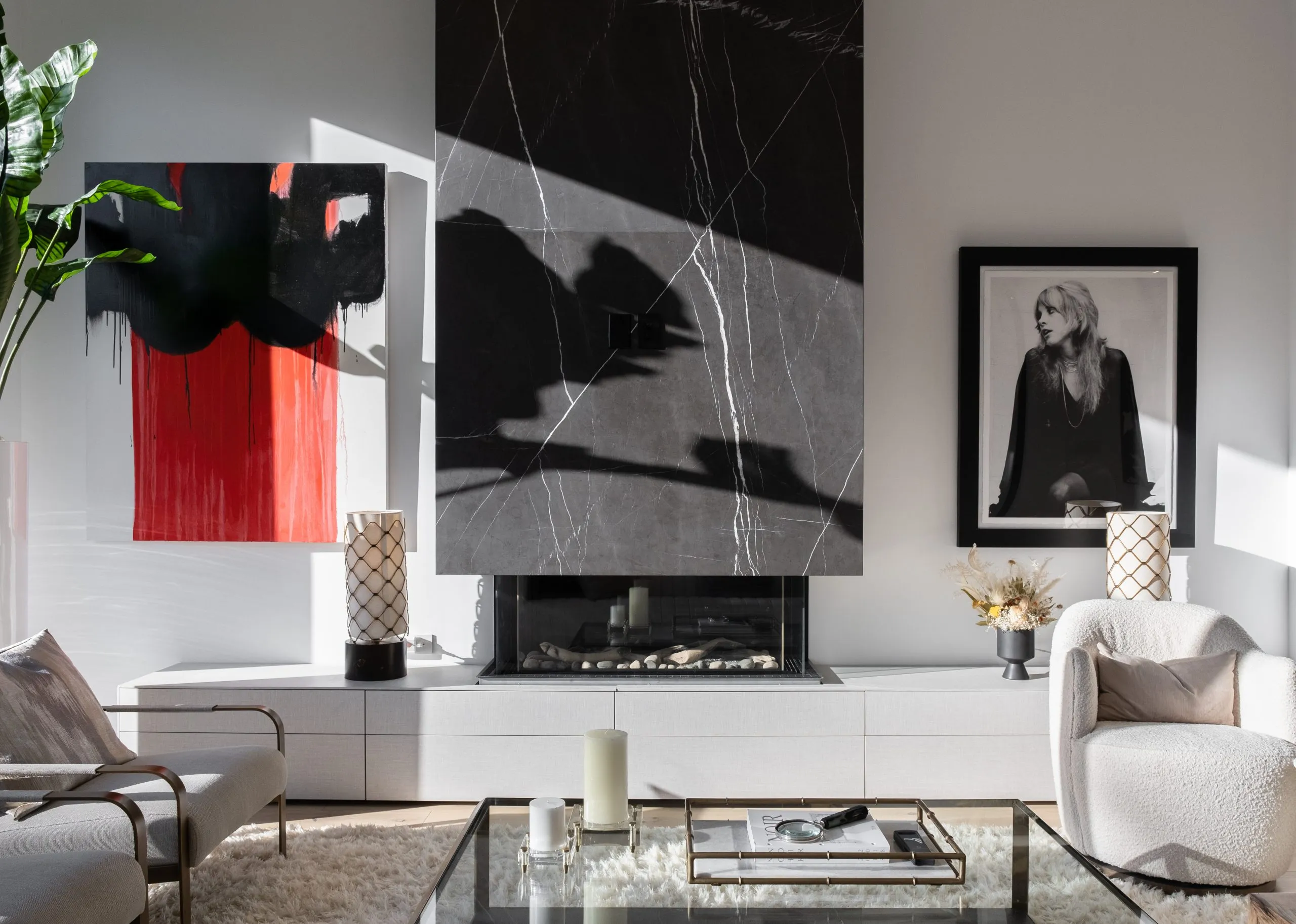 Living room with fireplace and contemporary art