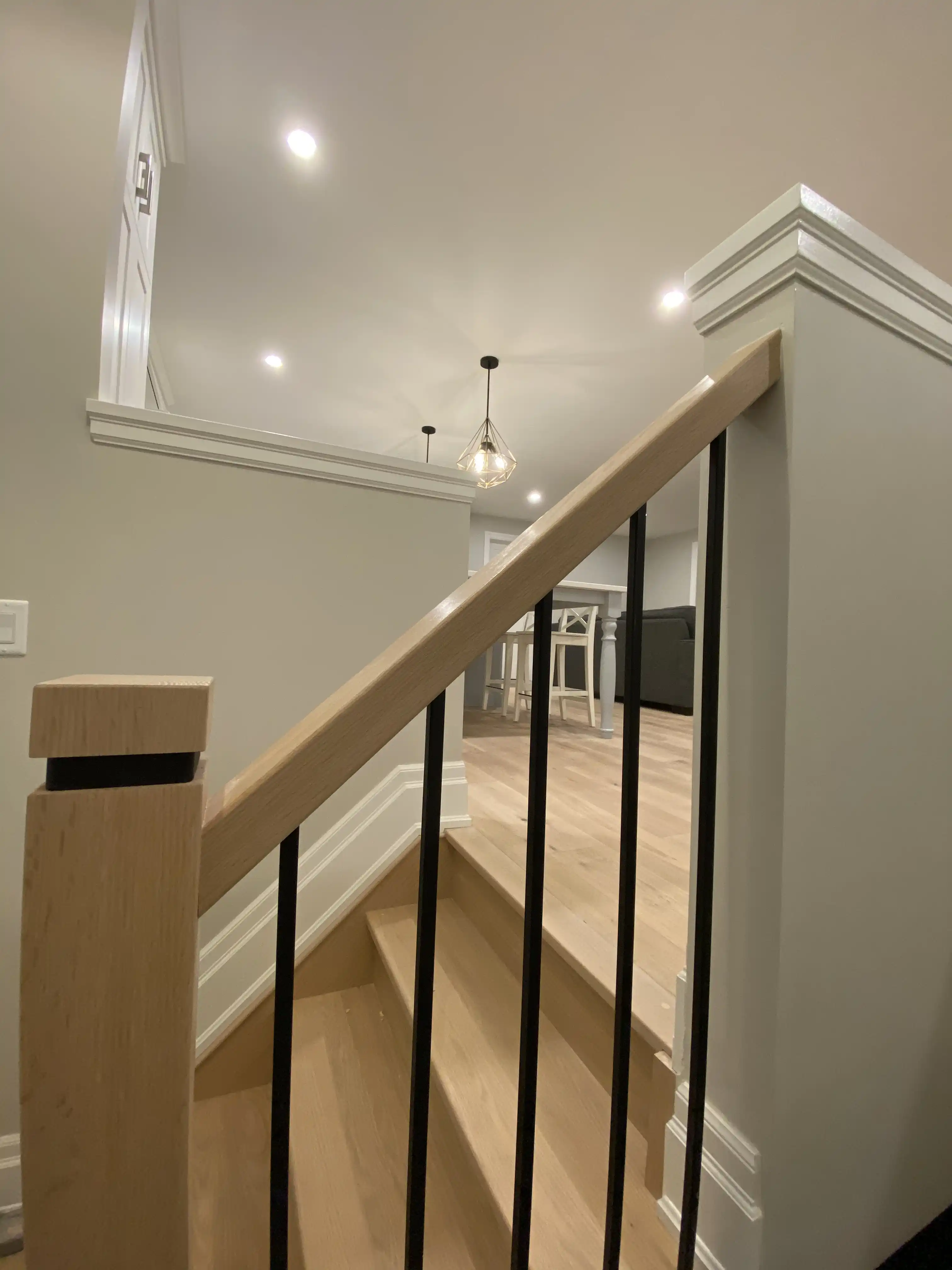 Stair railing and open main floor view