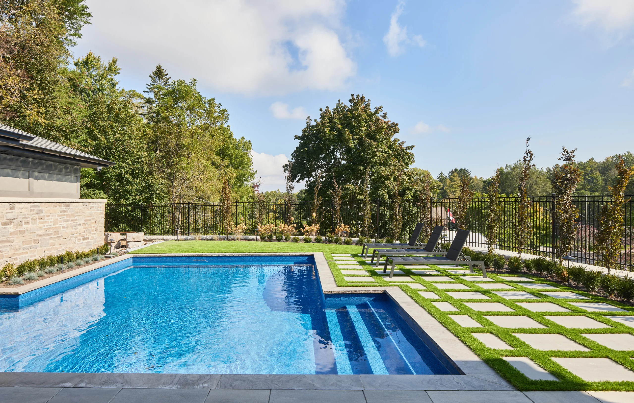 Pool and landscaped lawn