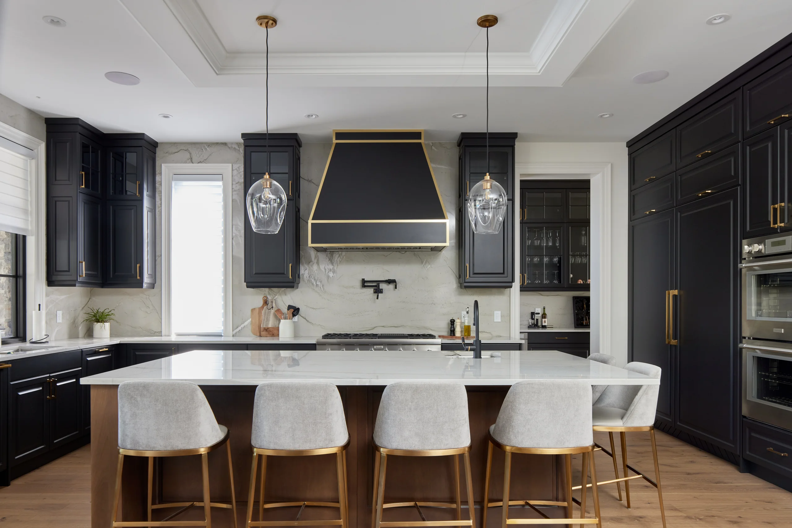 Dark kitchen with wood island