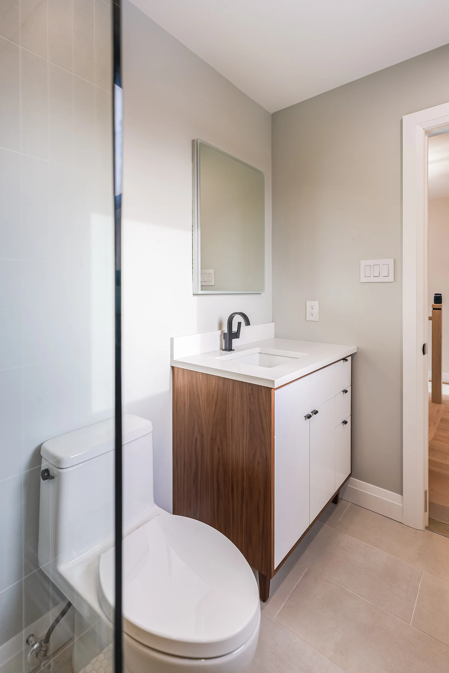 Bathroom vanity and toilet