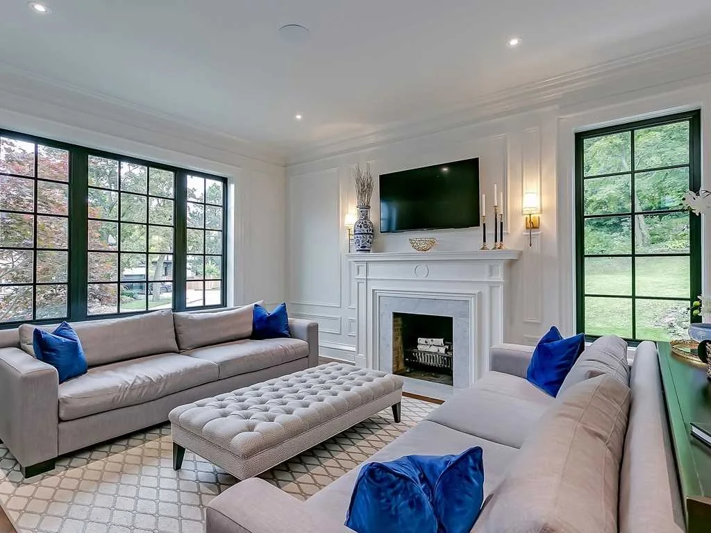 Living room with fireplace and blue sofa