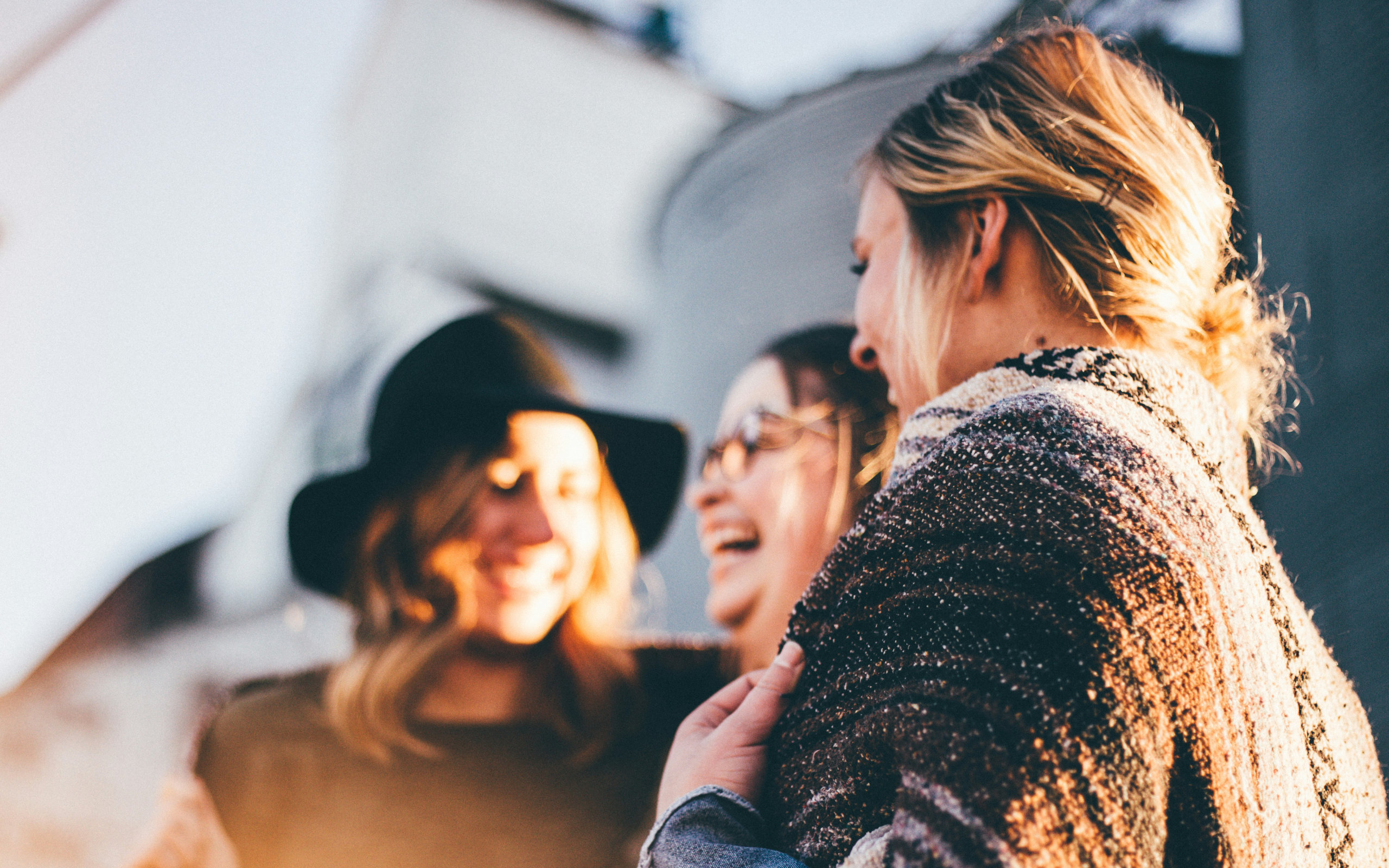 Women sharing authentic moments of joy and connection