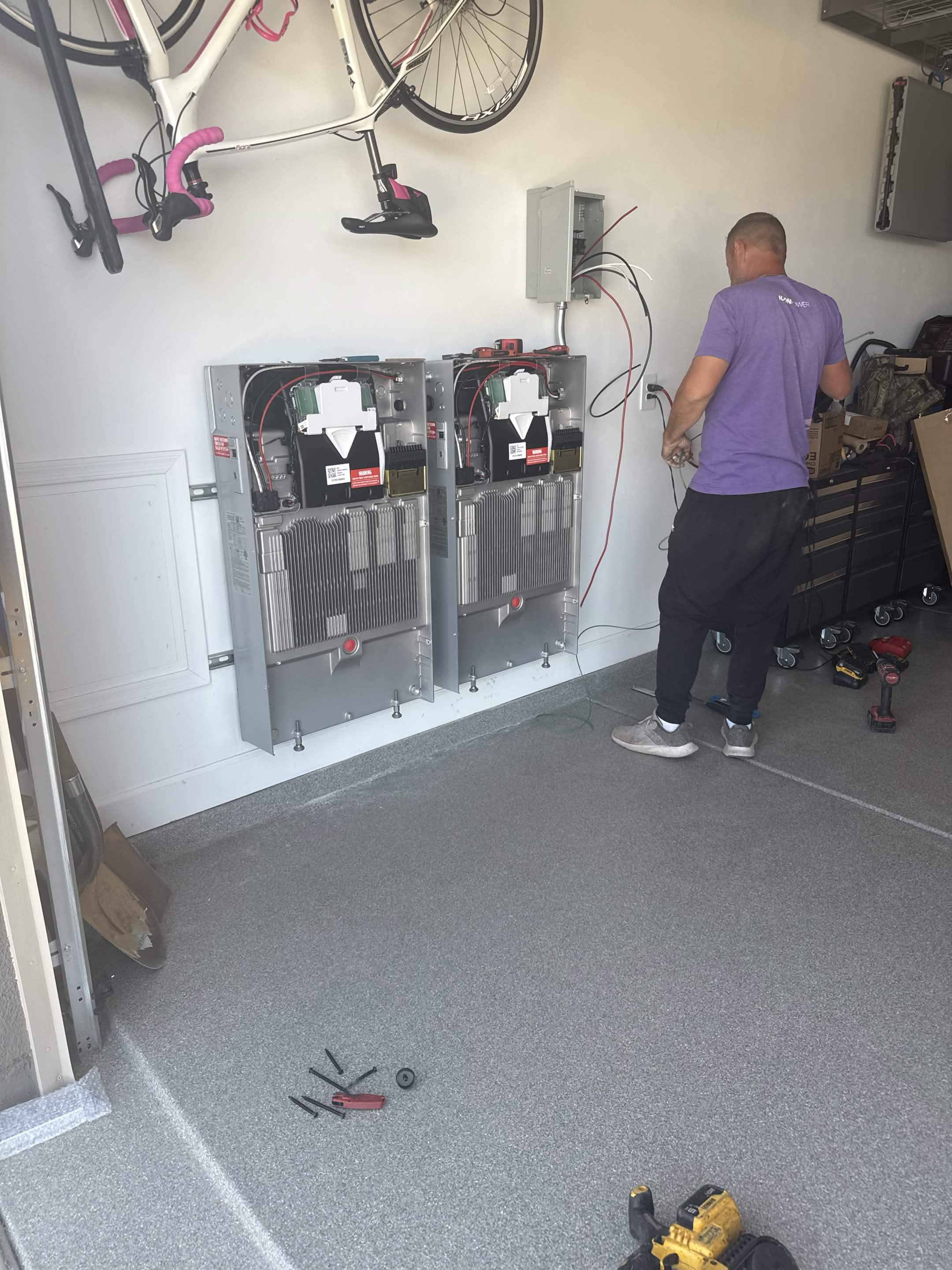 Technician working on solar equipment in Arizona