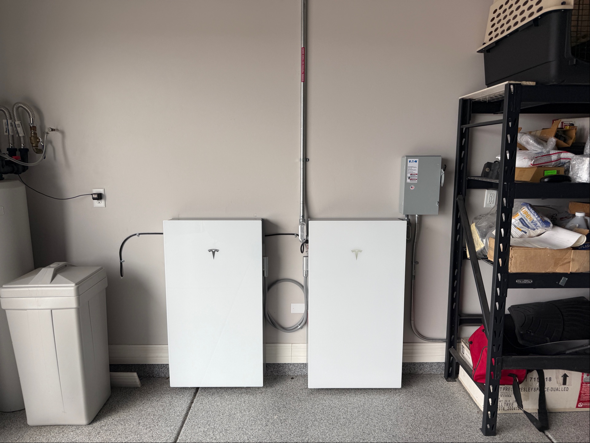 Two Tesla Powerwall 3 batteries in an Arizona garage