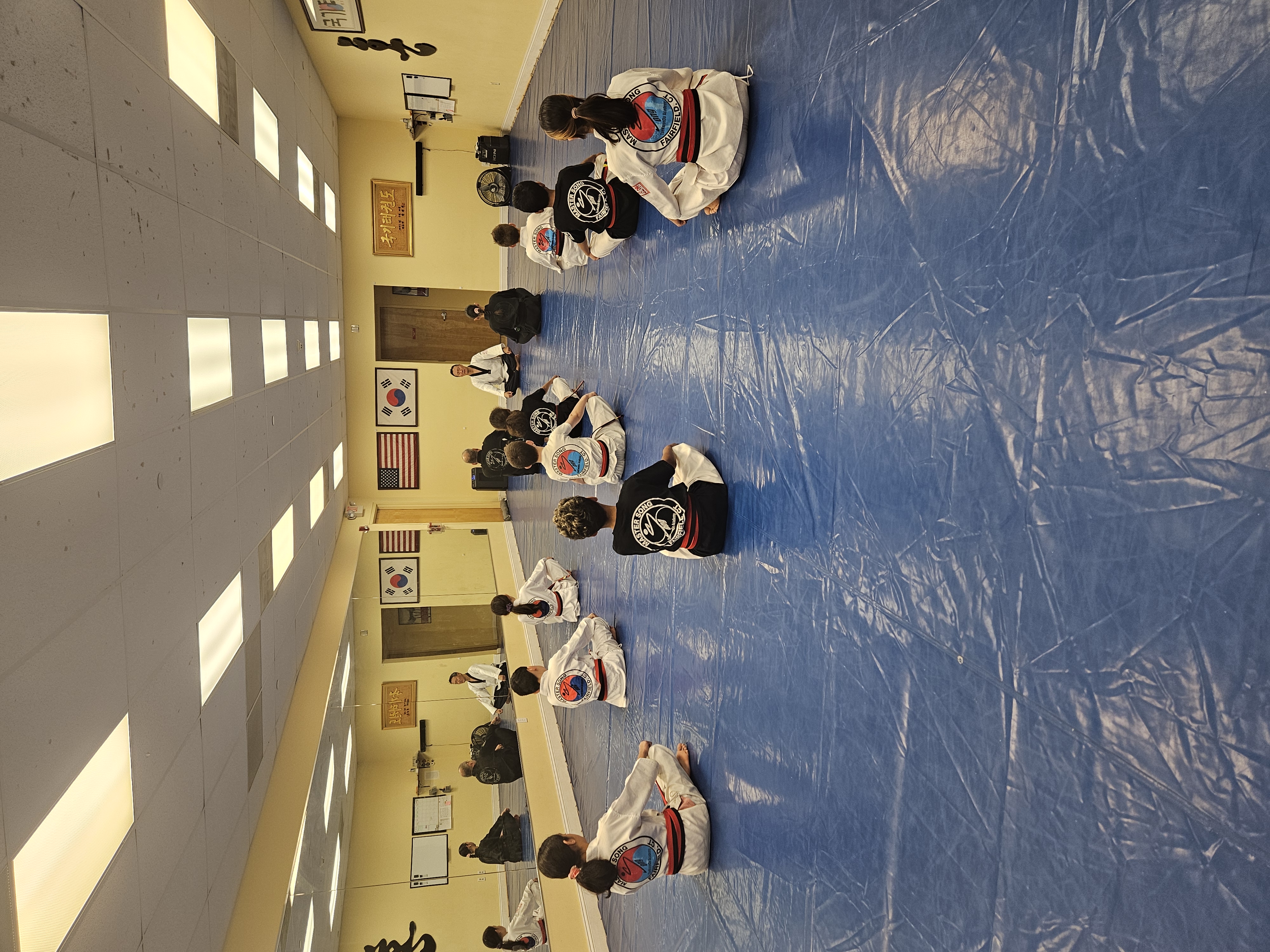 Children practicing Tae Kwon Do in class