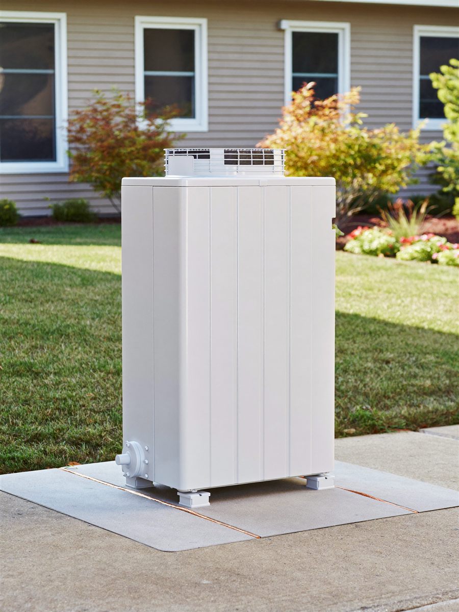 New HVAC condenser unit installed beside a home