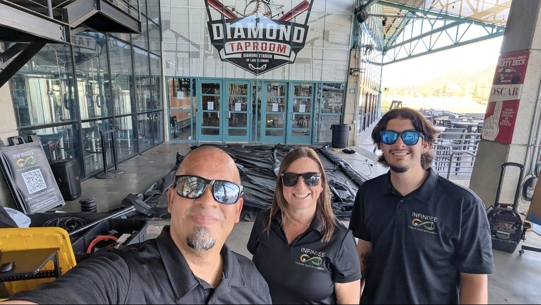 Orlando, Michelle, and Brady Ayala, the family behind InfiniTEE Mobile Golf Simulator in Menifee CA
