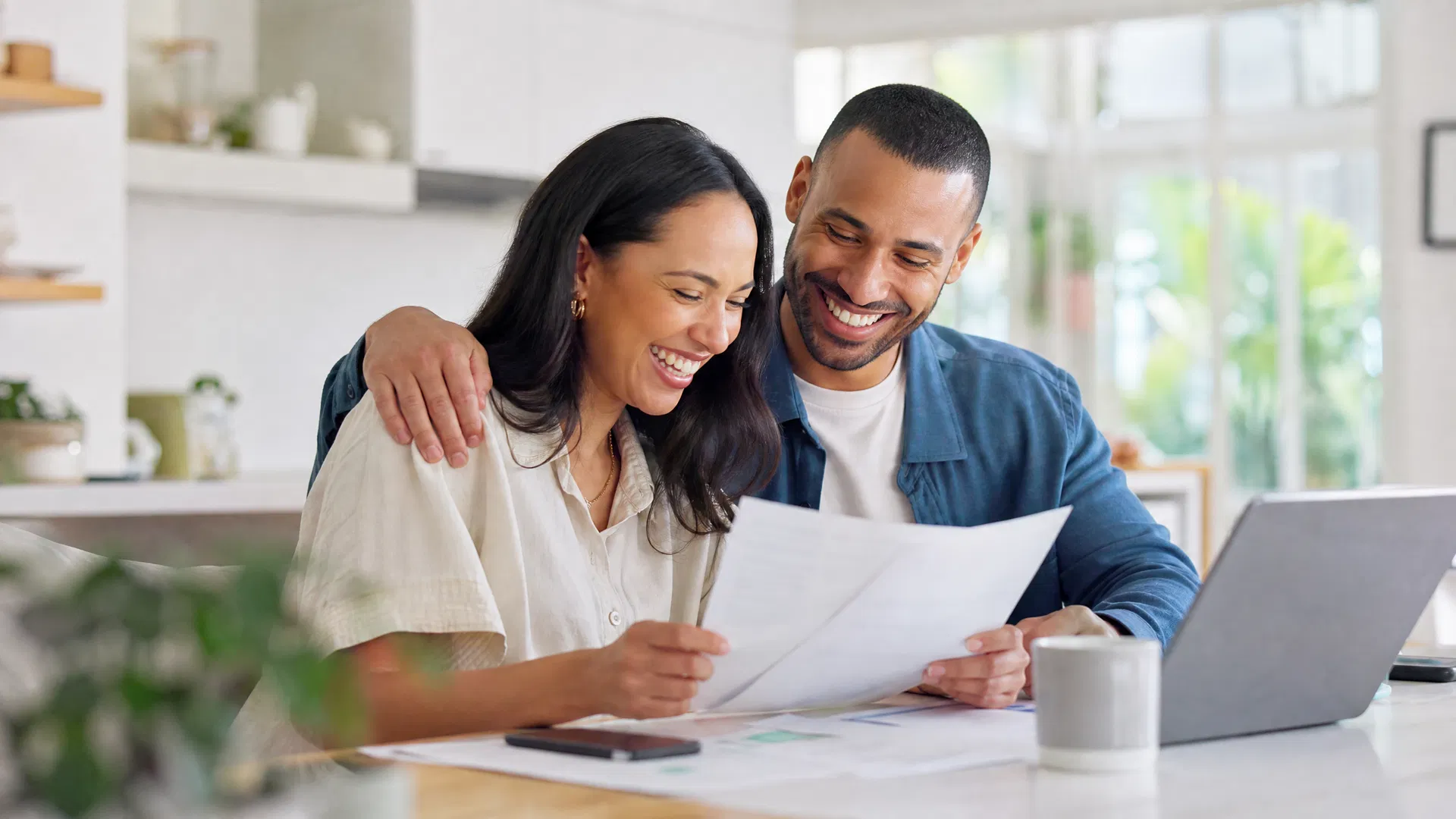 A couple reviewing their personalized debt relief plan together