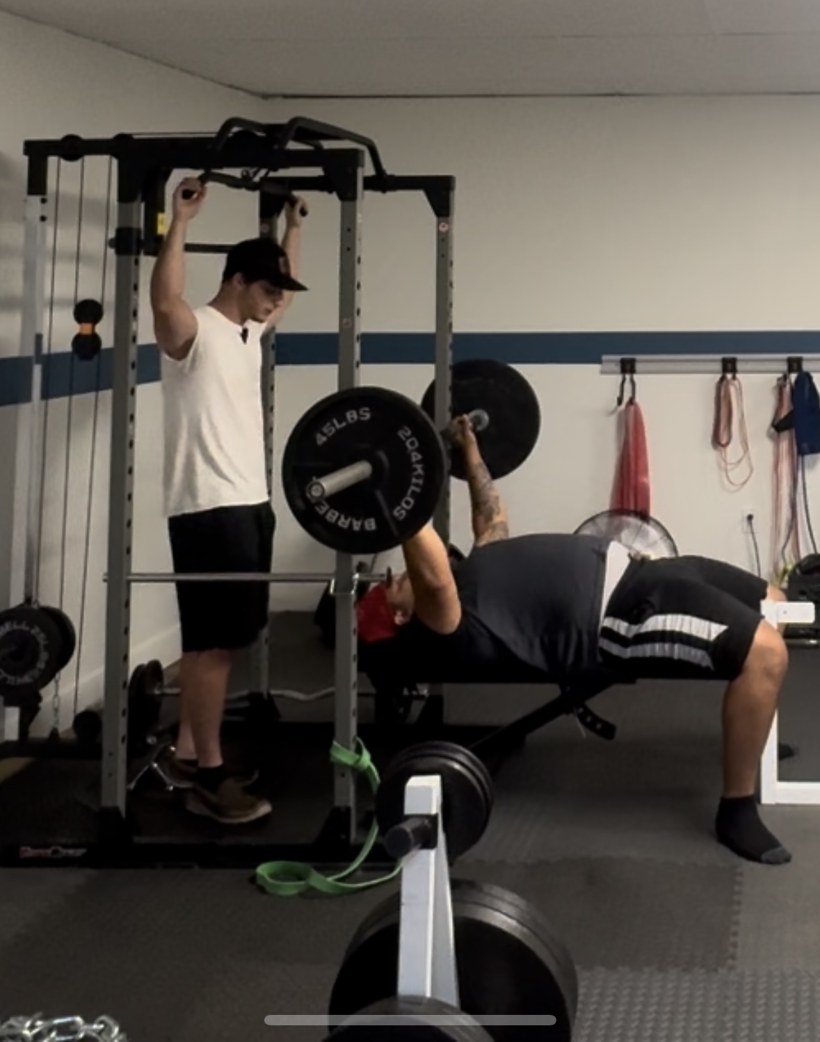 Coach Maxwell Taborsky personal trainer coaching a client at My Fitness Guide West Lansing MI