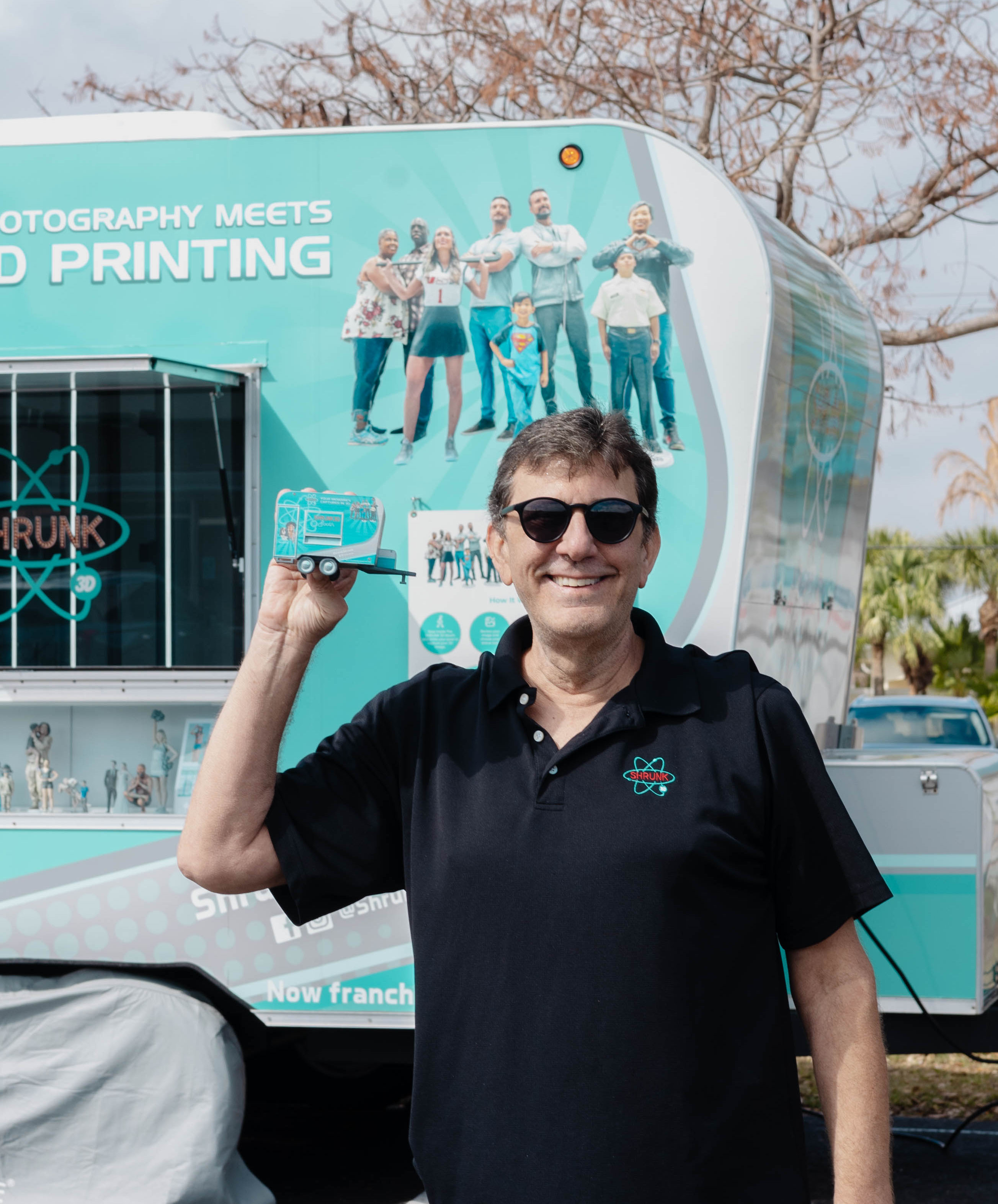 Shrunk 3D Space Coast mobile studio with miniature figurines display