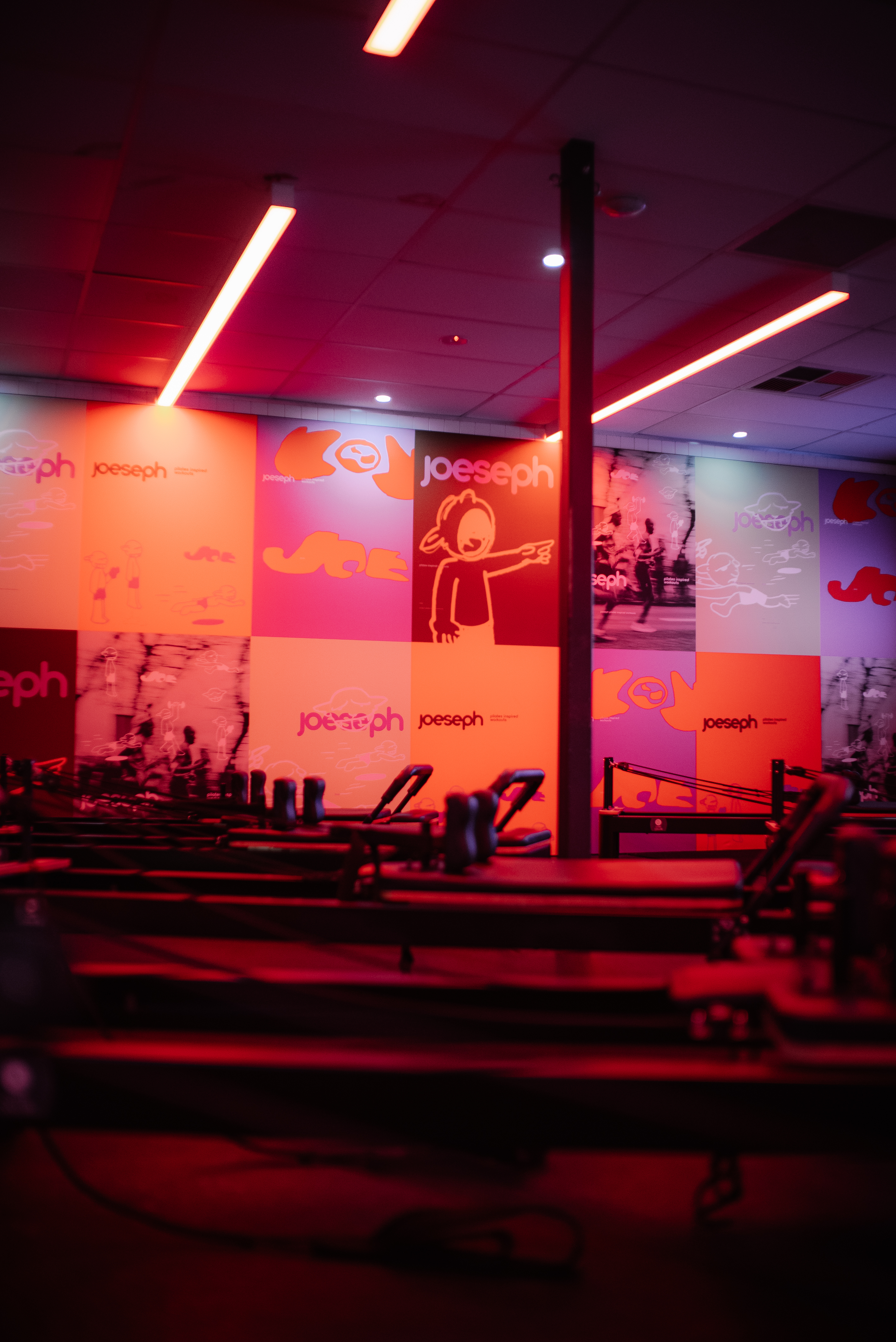 Reformer beds and the JOESEPH branded studio wall