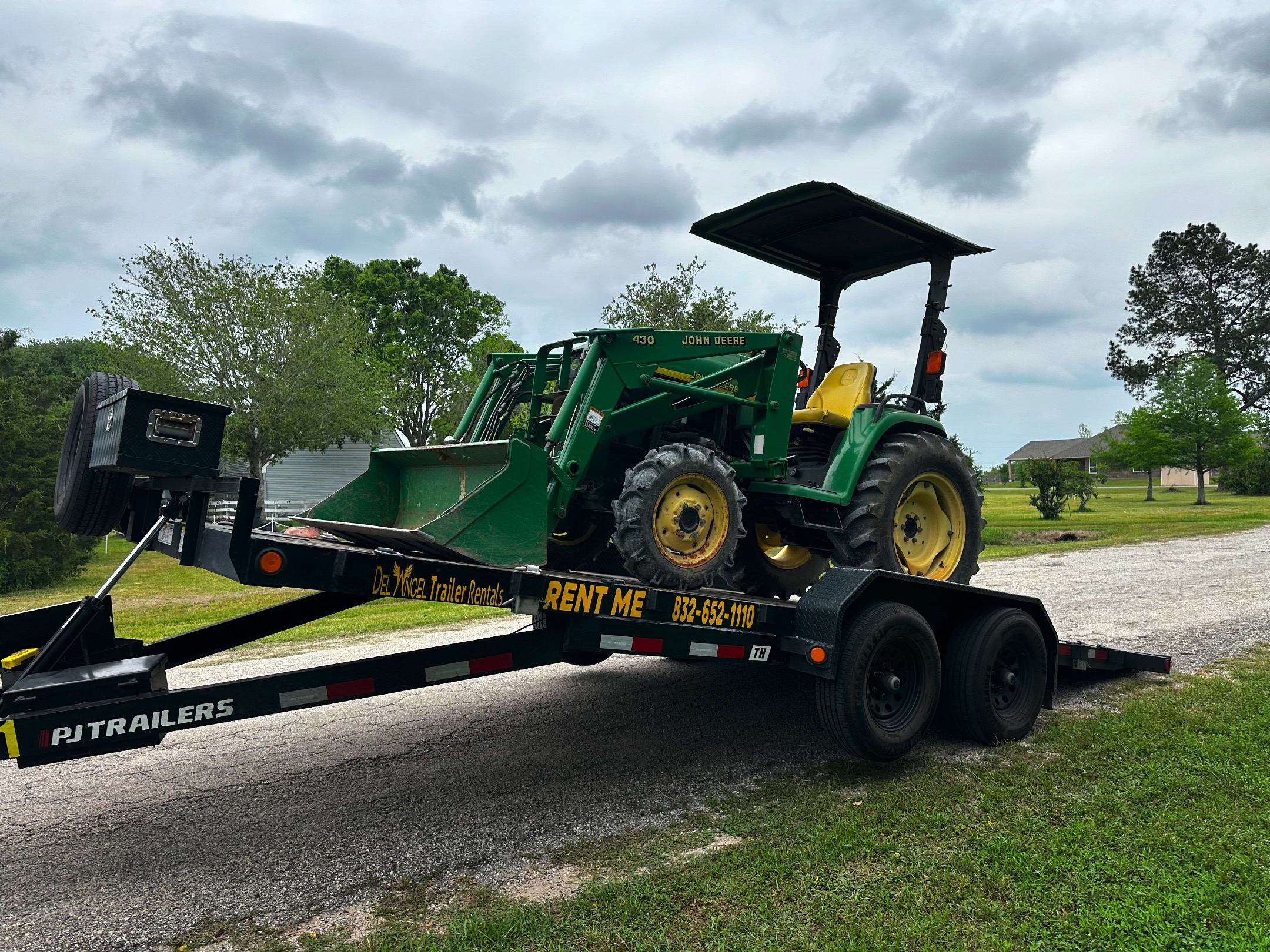 Car hauler trailer rental lineup at Del Angel Trailer Rentals in Cypress, TX