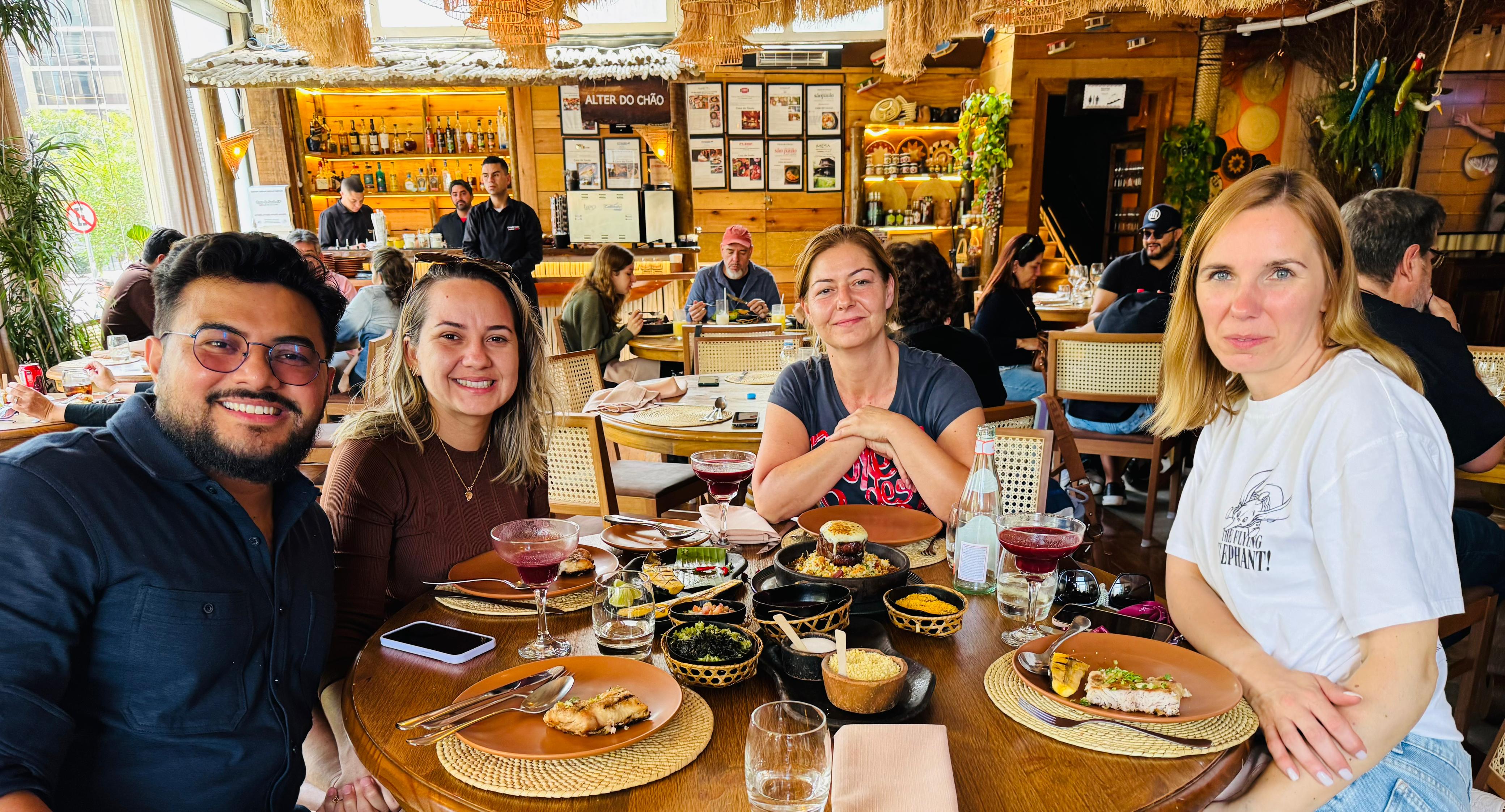 Rau and students at a restaurant
