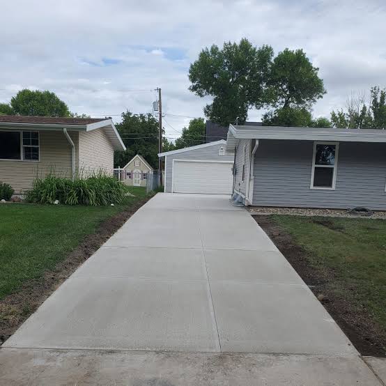 Heavy-duty concrete driveway replacement in Minot North Dakota