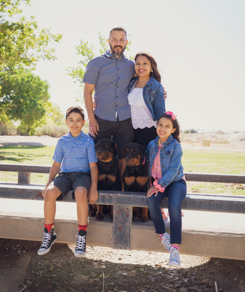 Manuel Martinez, his family and Rottweilers Poppy & Brutux