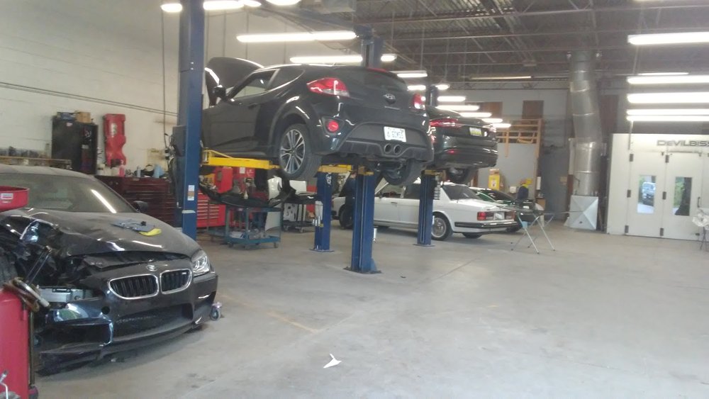 Close-up of collision repair and restoration work at Wixom Collision and Mechanical