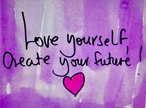 Handwritten black text reading “Love yourself, create your future!” with a pink heart, over a purple watercolor background Handwritten black text reading “Love yourself, create your future!” with a pink heart, over a purple watercolor background