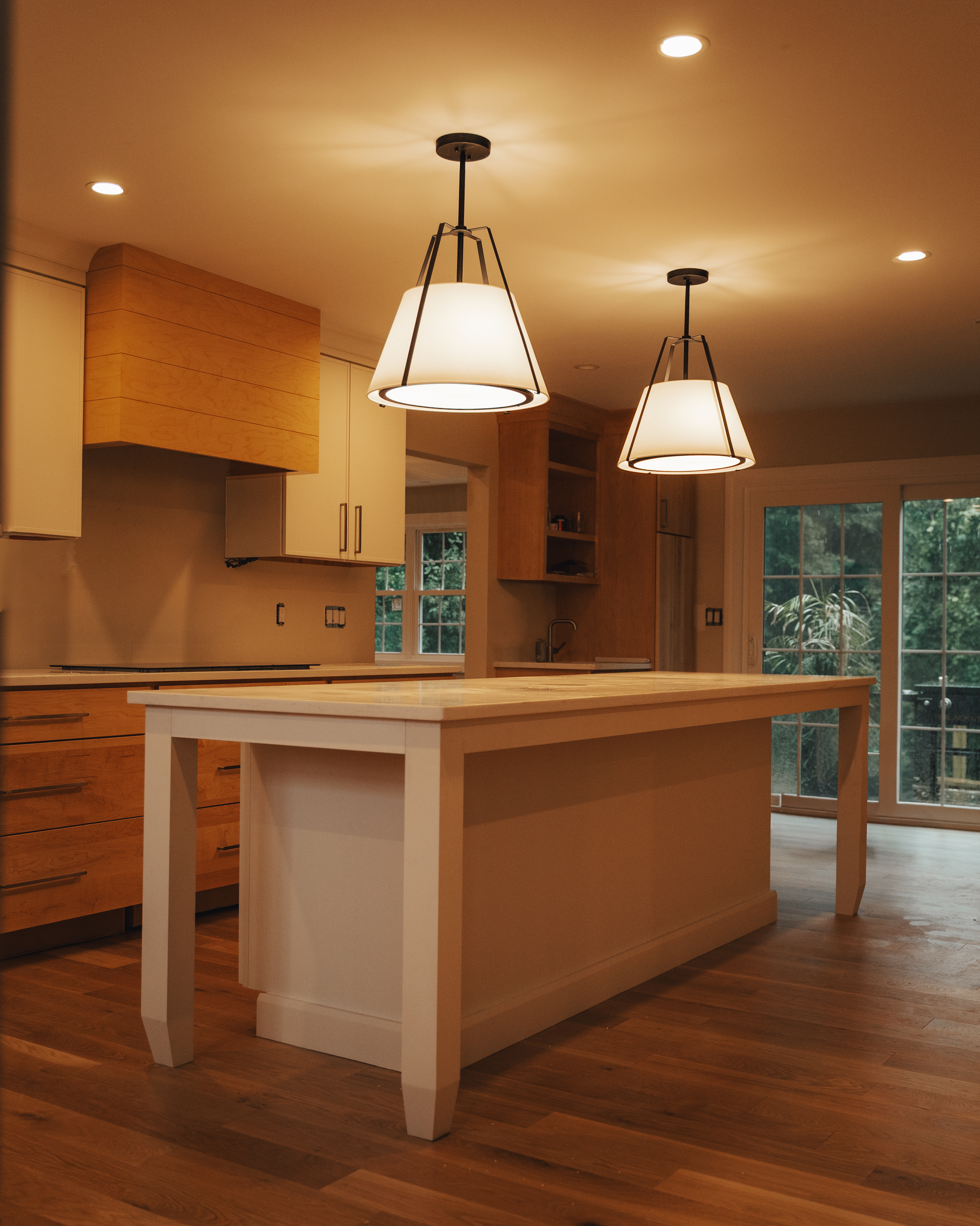 Kitchen pendant and recessed lighting installed by Zambarano Electric in Central Massachusetts