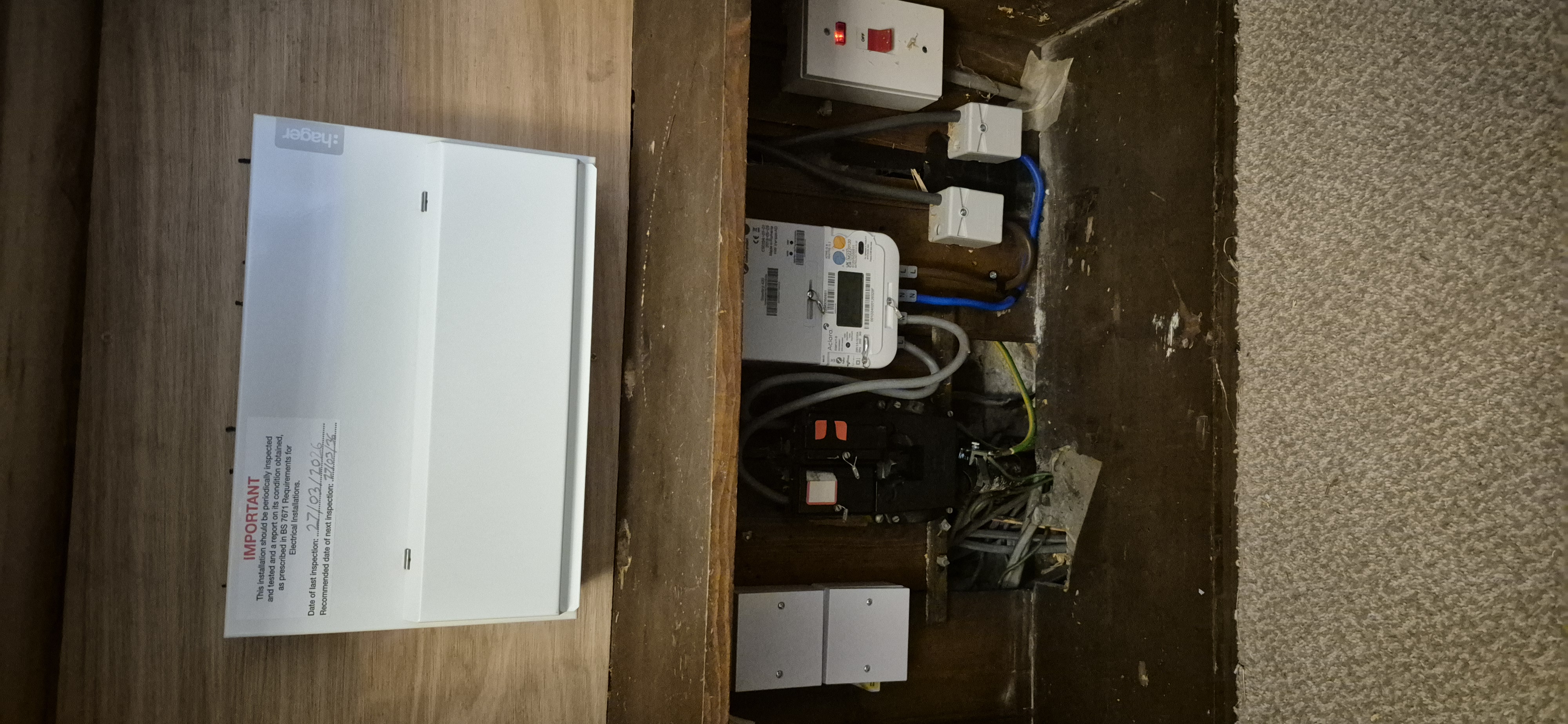 Completed consumer unit with official inspection label