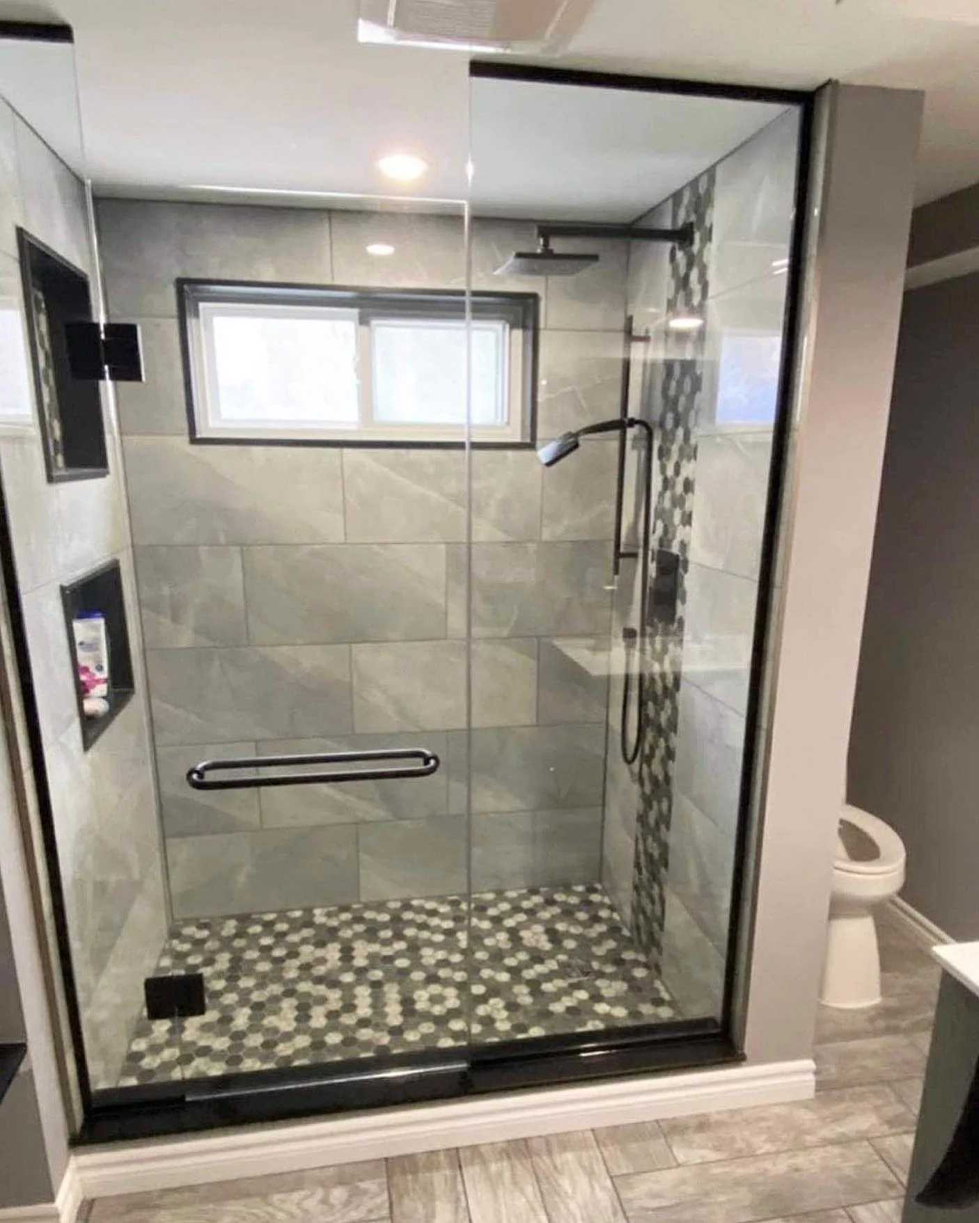 Walk-in shower with pebble floor