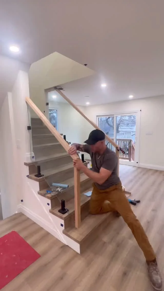 Royal Blue Construction team member completing interior finish work