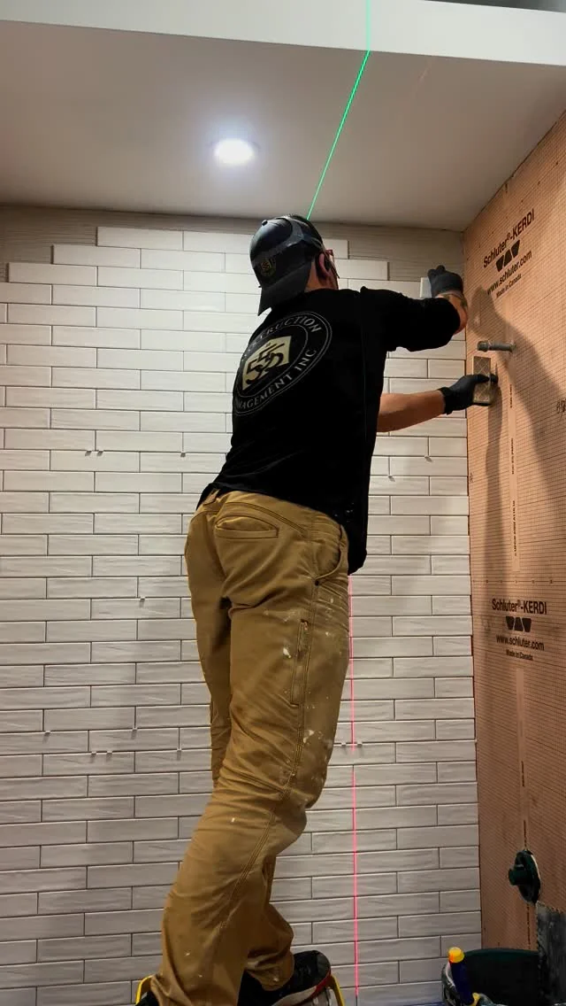 Royal Blue Construction tile installer at work