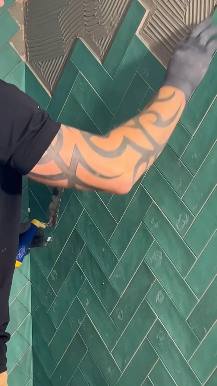 Specialty tile installer at work