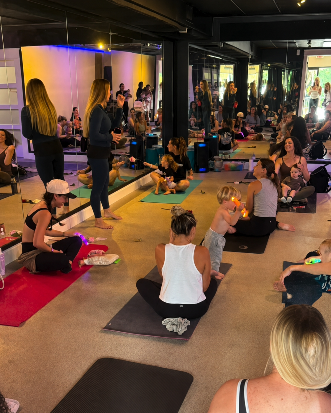 Mommy and Me yoga event at Torch Hot Yoga