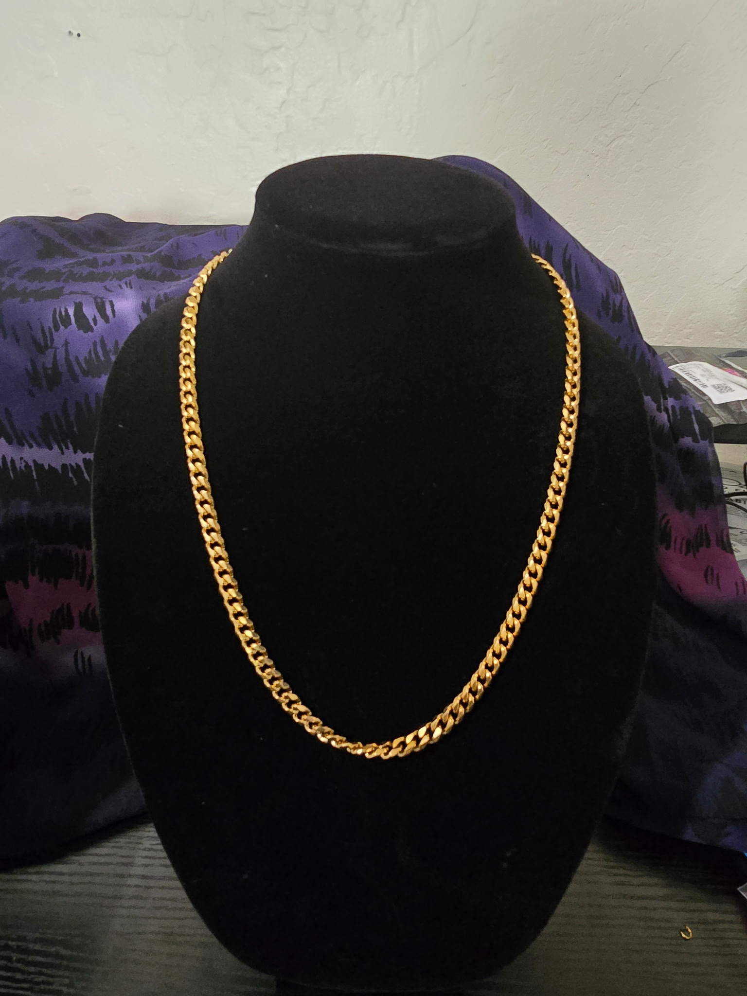 Gold cubana curb chain permanent jewelry display Arizona