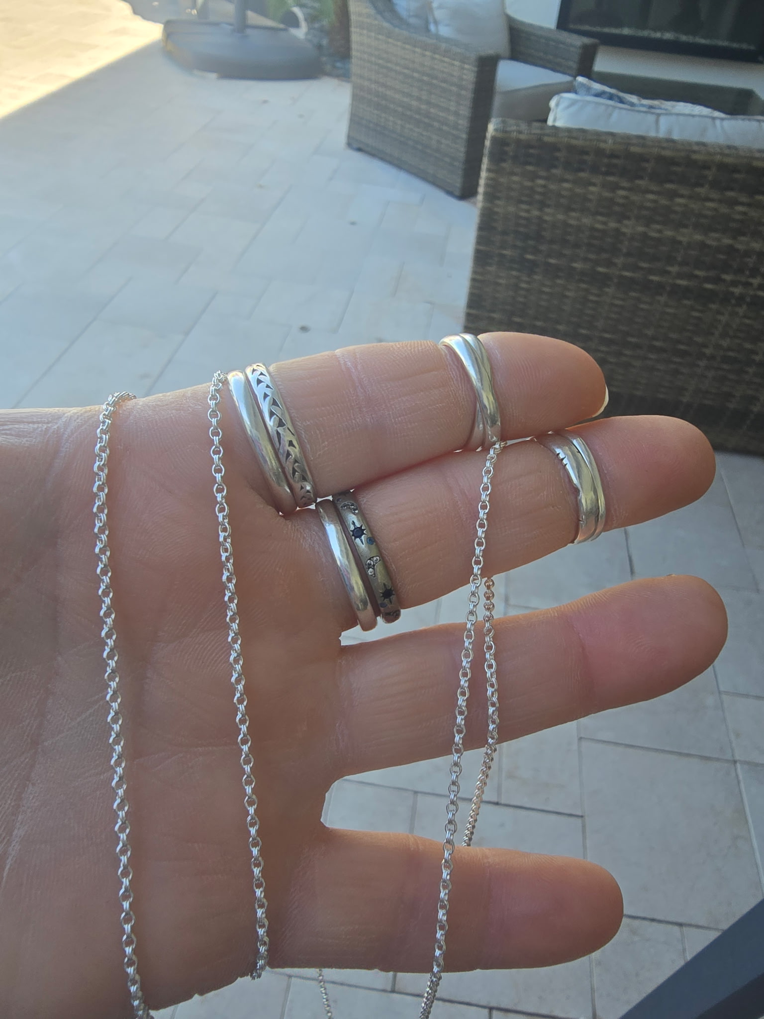 Permanent bracelet with cross faith charm on wrist Arizona