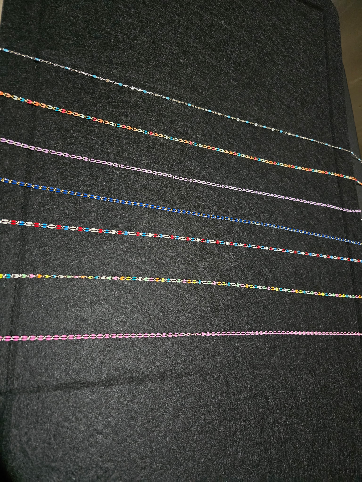 Colorful enamel permanent jewelry chains in multiple finishes, Eternally Linked Bling