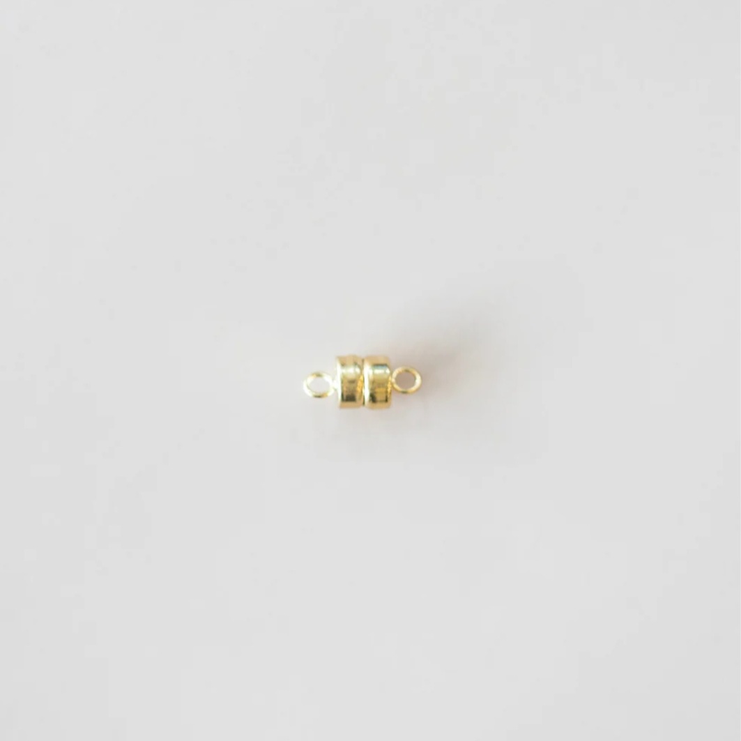 Gold filled magnetic clasp for permanent jewelry, product close-up