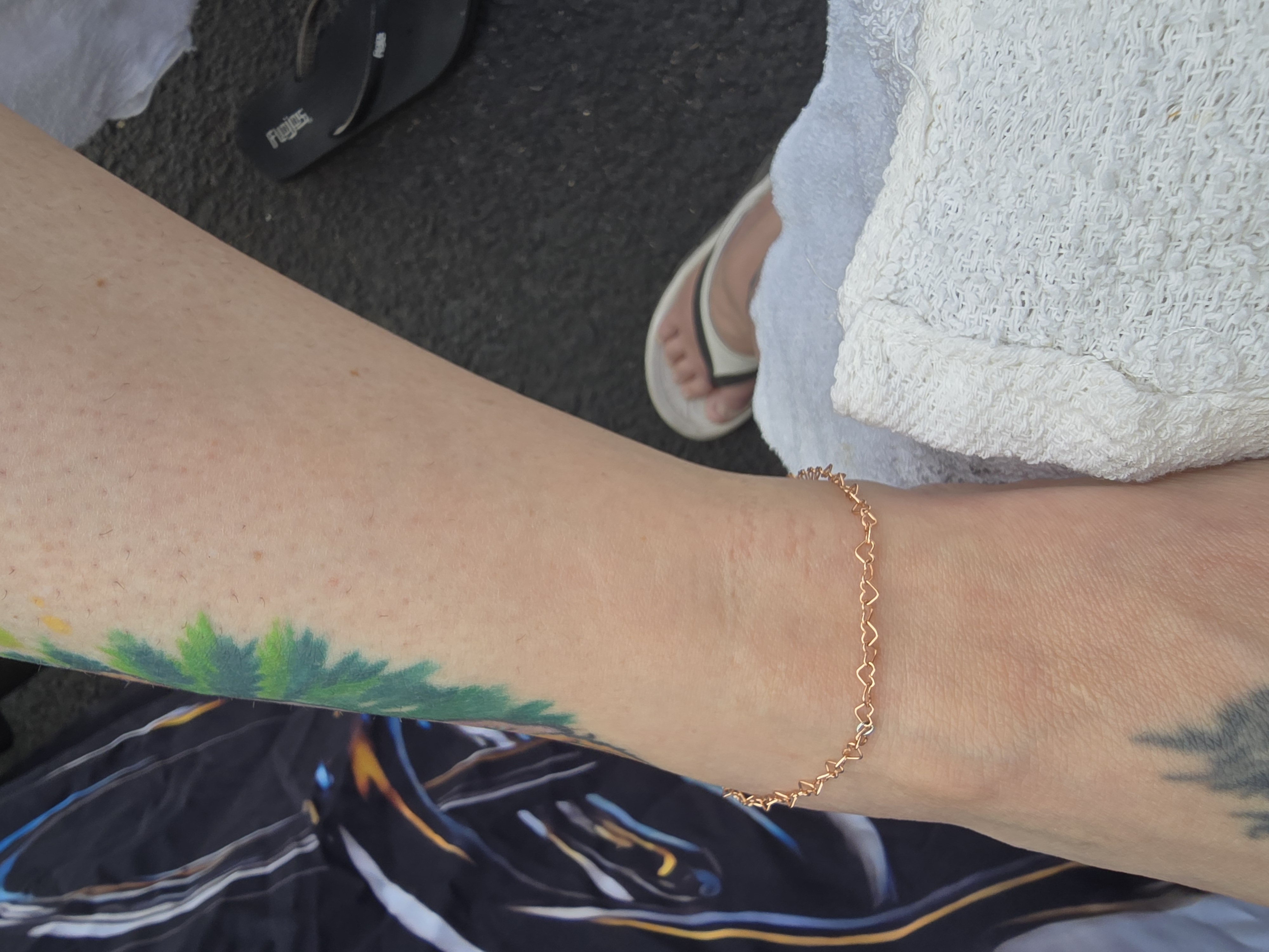 PVD rose gold permanent bracelet welded on a wrist, Eternally Linked Bling