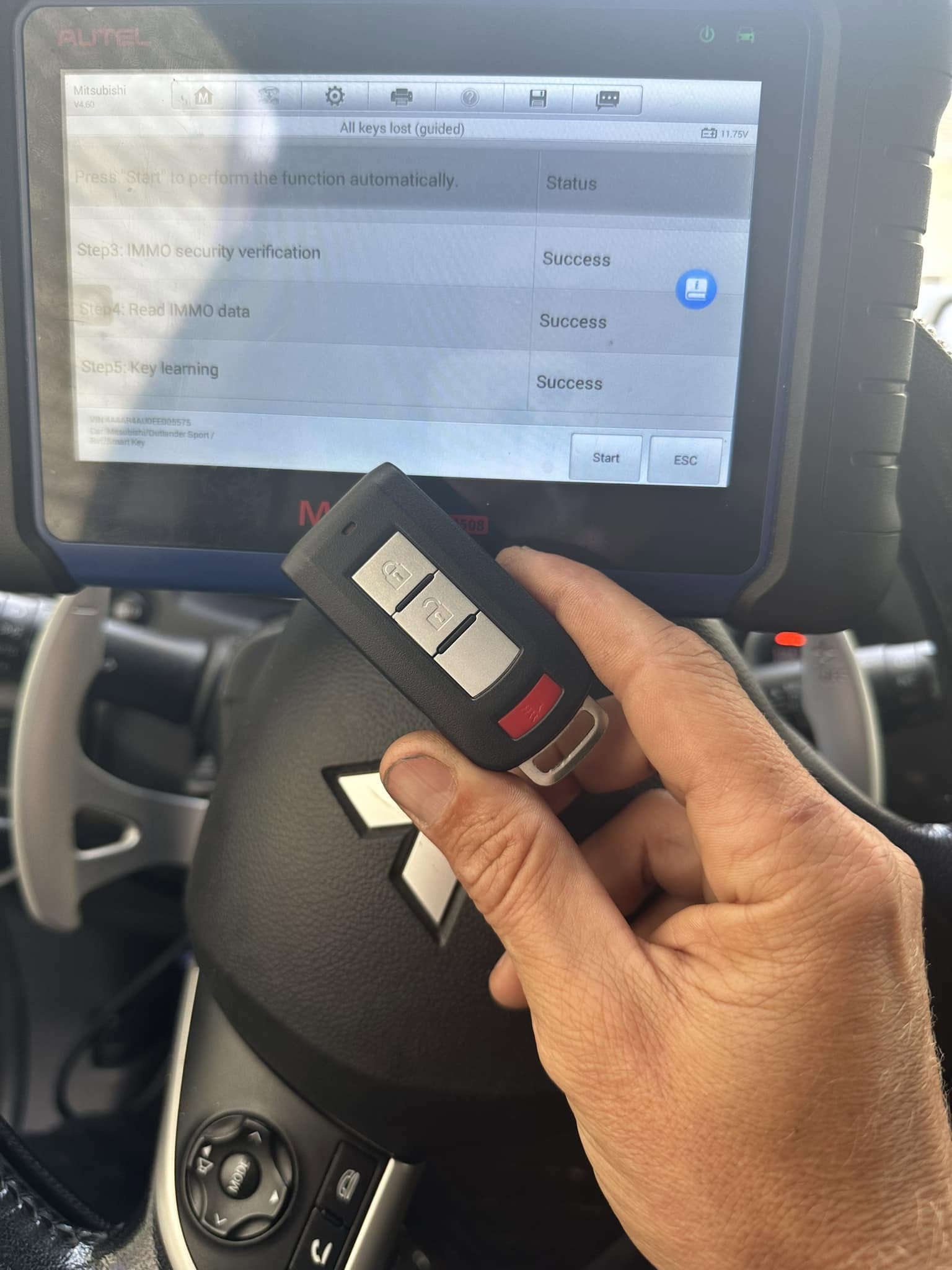 Buffalo Mobile Locksmith technician finishing a car key replacement job