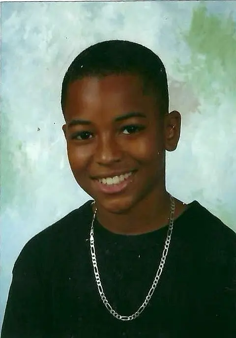 Young Will smiling for a portrait