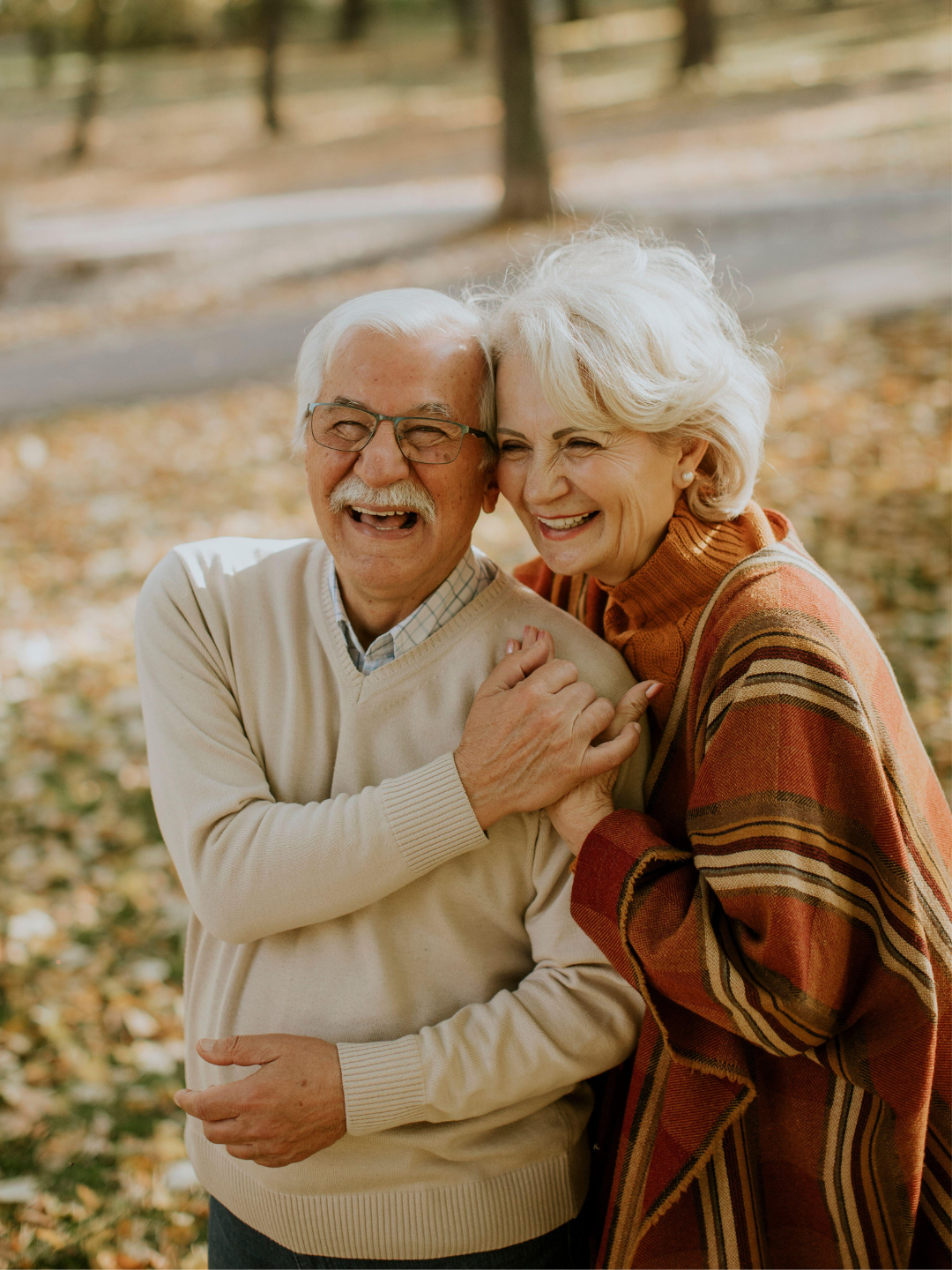 Happy senior couple walking outdoors