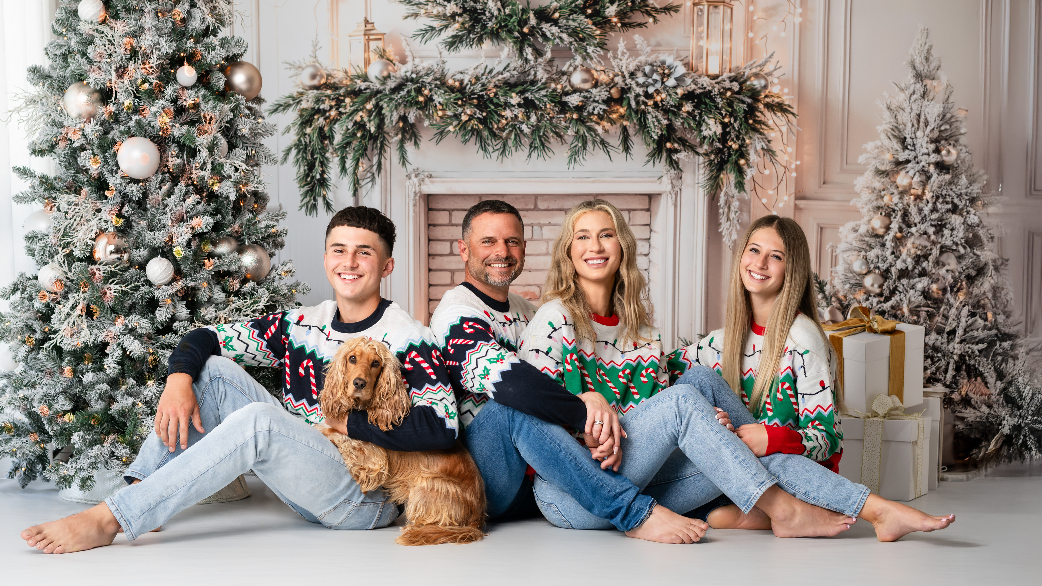 Family of four with their dog at a Christmas studio photoshoot in Thornlands
