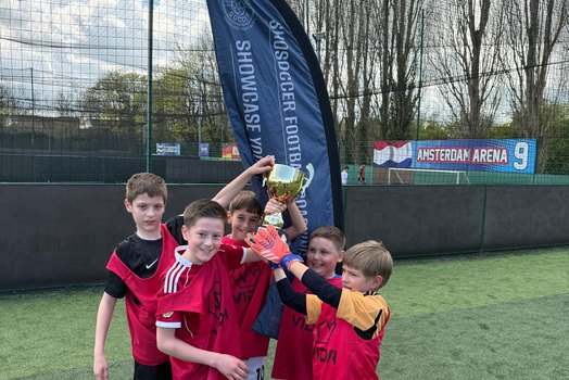 Camp prize winners with their prizes at Goals