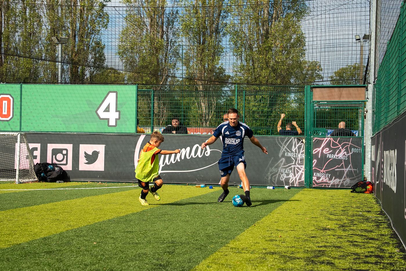 A player takes on a ShoSoccer coach