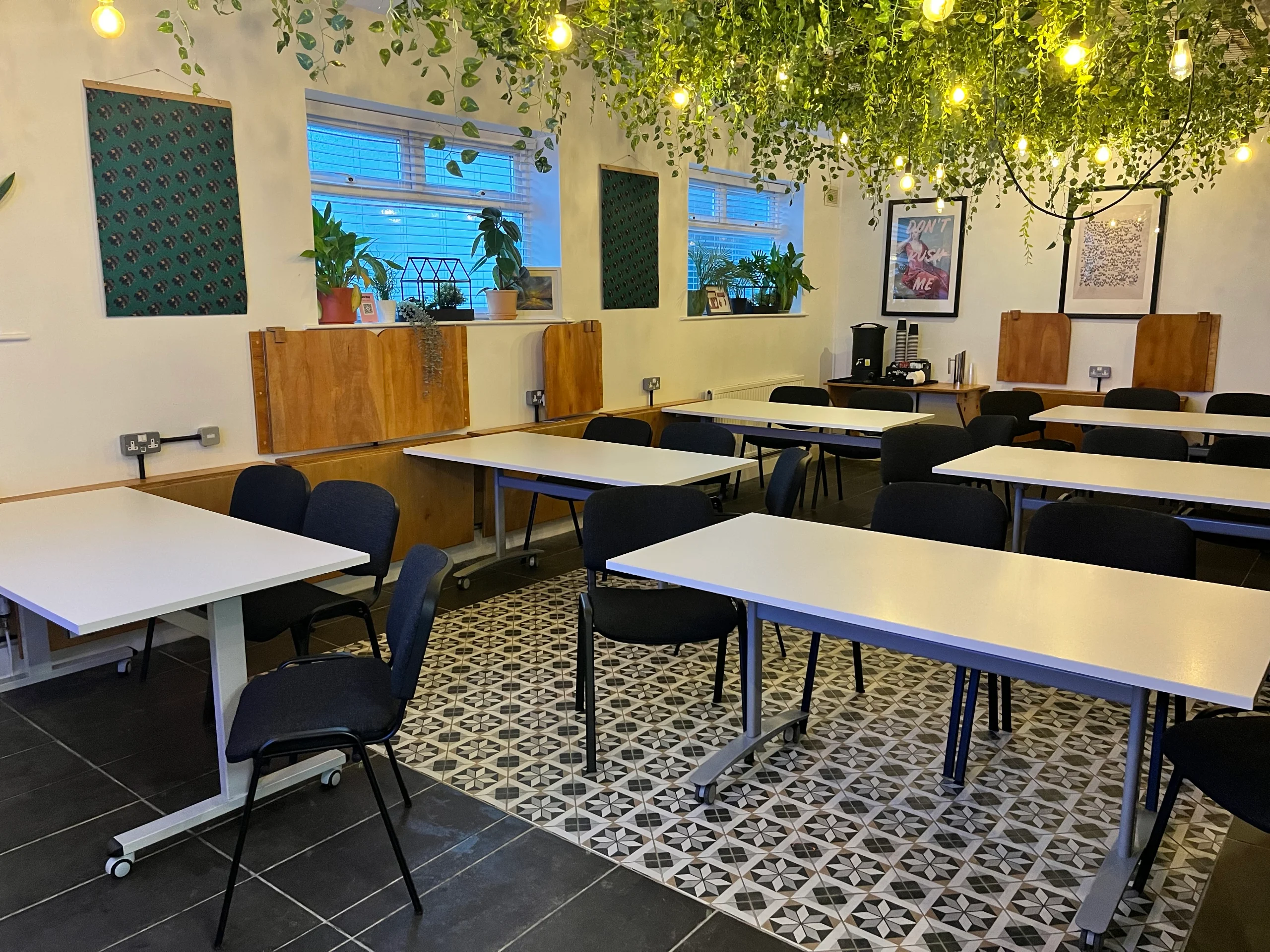 The Grove at the Maggie O'Neill Centre set classroom style under the greenery canopy